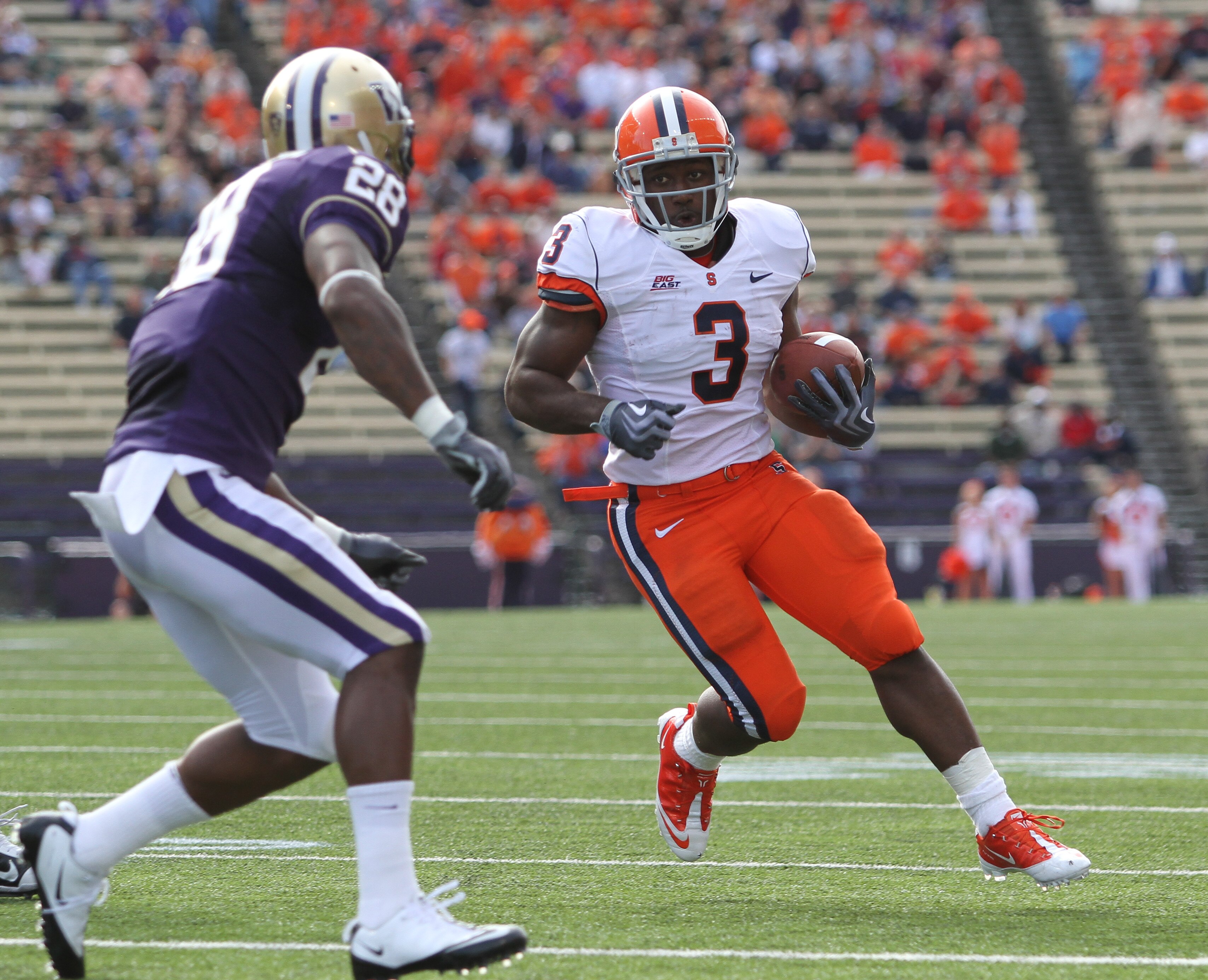 SEATTLE - SEPTEMBER 11: Running back Delone Carter #3 of the Syracuse Orange rushes against Quinton Richardson #28 of the Washington Huskies on September 11, 2010 at Husky Stadium in Seattle, Washington. (Photo by Otto Greule Jr/Getty Images) SEATTLE - SEPTEMBER 11: Running back Delone Carter #3 of the Syracuse Orange rushes against Quinton Richardson #28 of the Washington Huskies on September 11, 2010 at Husky Stadium in Seattle, Washington. (Photo by Otto Greule Jr/Getty Images)
