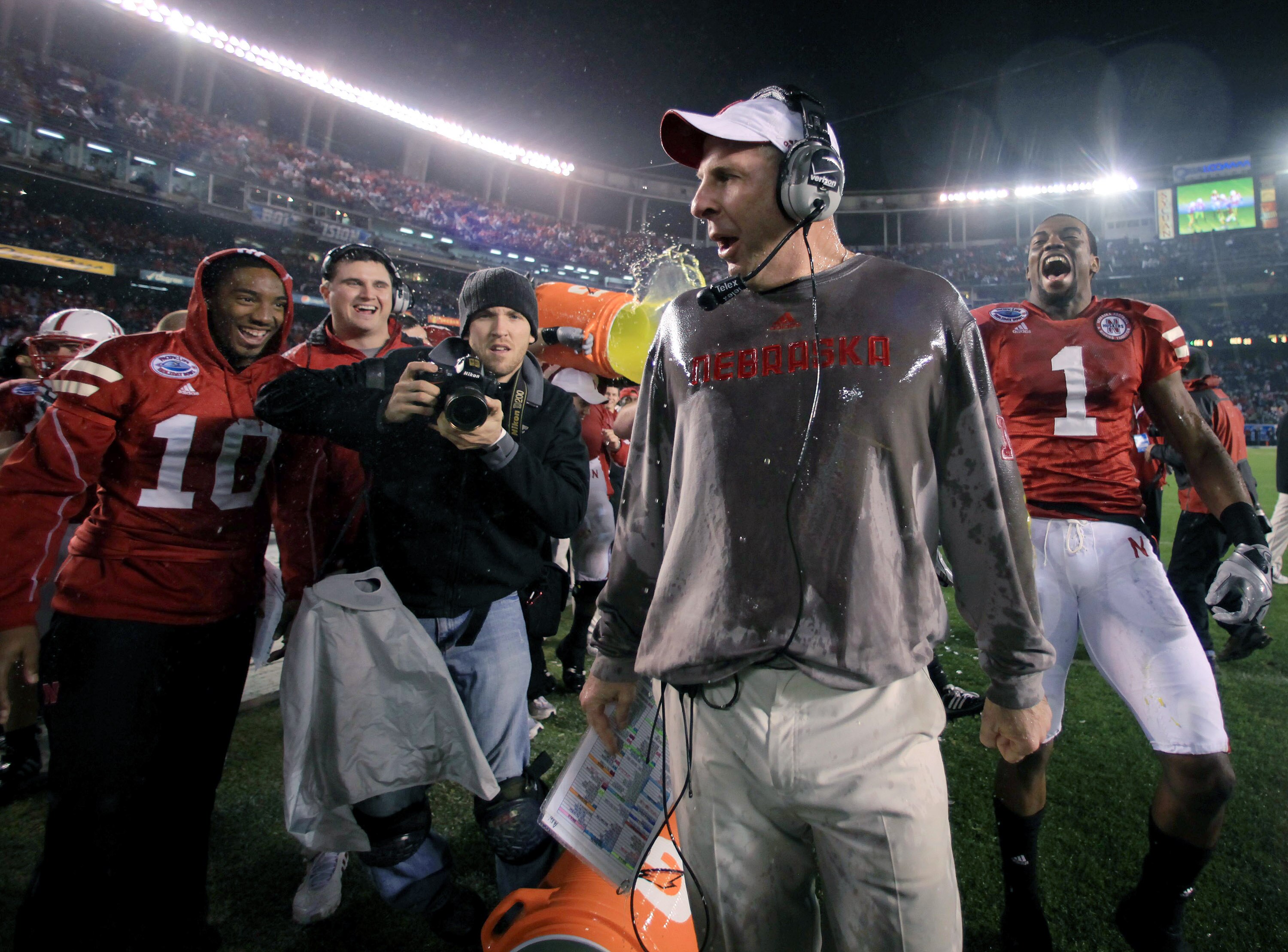 SAN DIEGO, CA - DECEMBER 30: Head Coach Bo Pelini of the University of Nebraska Cornhuskers looks around after having sport drink dumped on him after their team's 33-0 victory against the University of Arizona Wildcats during the Pacific Life Holiday Bow SAN DIEGO, CA - DECEMBER 30: Head Coach Bo Pelini of the University of Nebraska Cornhuskers looks around after having sport drink dumped on him after their team's 33-0 victory against the University of Arizona Wildcats during the Pacific Life Holiday Bow