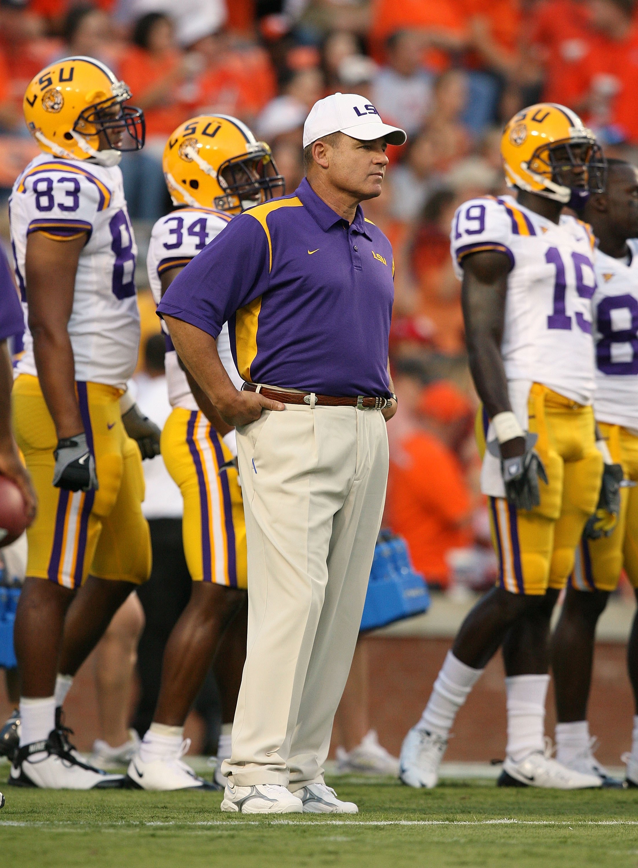AUBURN, AL - SEPTEMBER 20: Head coach Les Miles of the LSU Tigers watches his team warm-up prior to taking on the Auburn Tigers at Jordan-Hare Stadium on September 20, 2008 in Auburn, Alabama. LSU defeated Auburn 26-21. (Photo by Doug Benc/Getty Images) AUBURN, AL - SEPTEMBER 20: Head coach Les Miles of the LSU Tigers watches his team warm-up prior to taking on the Auburn Tigers at Jordan-Hare Stadium on September 20, 2008 in Auburn, Alabama. LSU defeated Auburn 26-21. (Photo by Doug Benc/Getty Images)