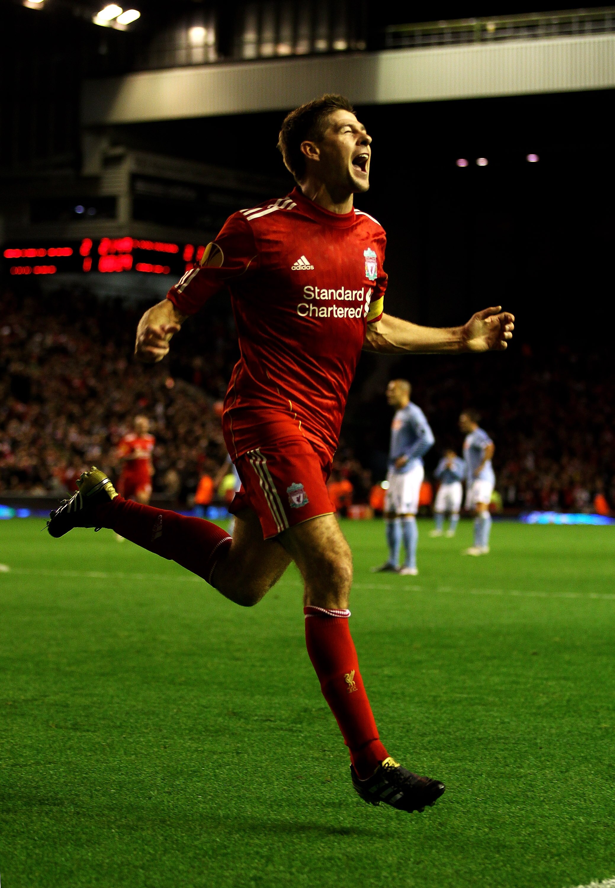 LIVERPOOL, ENGLAND - NOVEMBER 04:  Steven Gerrard of Liverpool celebrates scoring his team's third goal and his hat trick during the UEFA Europa League Group K match beteween Liverpool and SSC Napoli at Anfield on November 4, 2010 in Liverpool, England.