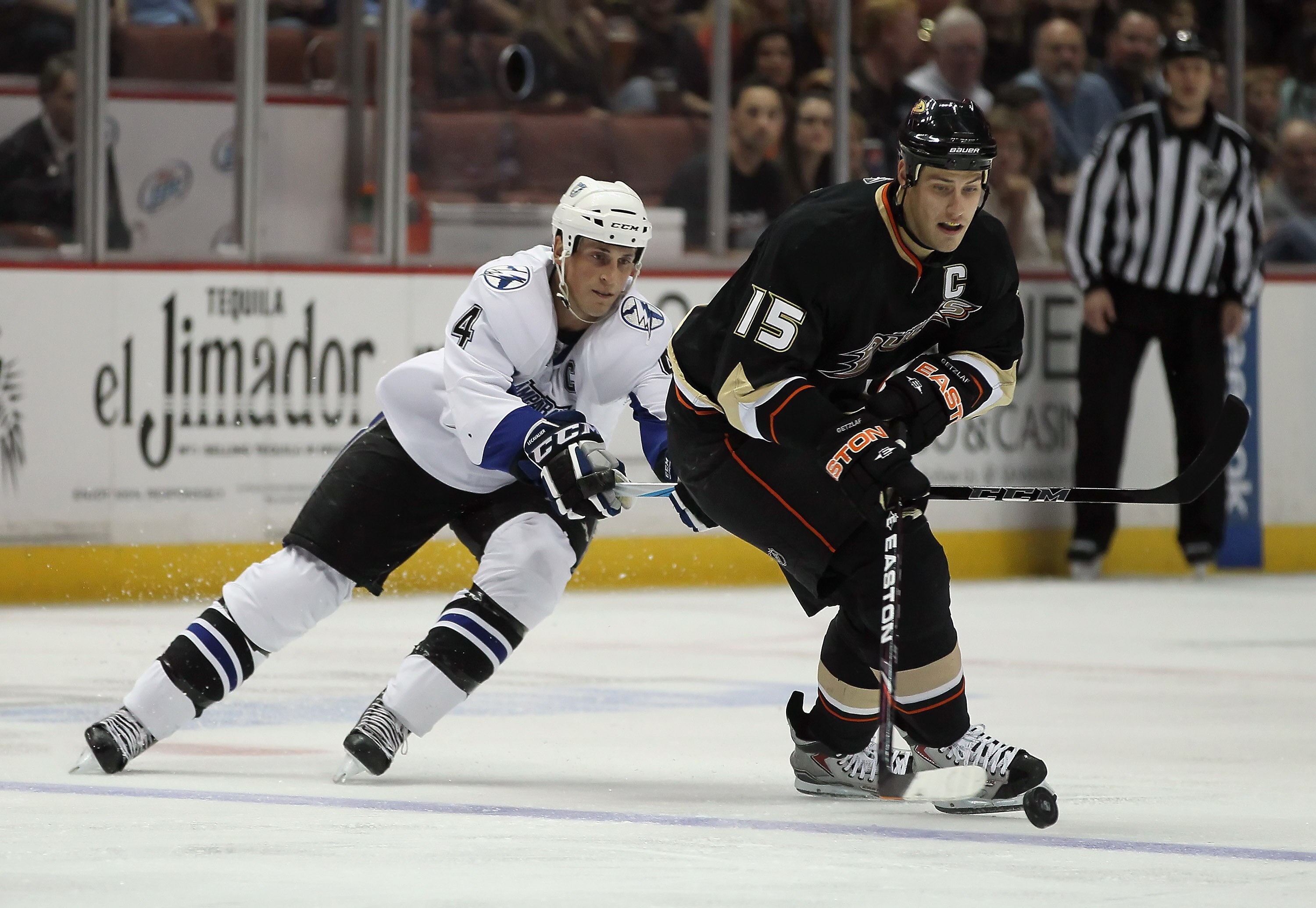 ANAHEIM, CA - NOVEMBER 03:  Ryan Getzlaf #15 of the Anaheim Ducks is pursued by Vincent Lecavalier #4 of the Tampa Bay Lightning in the second period at the Honda Center on November 3, 2010 in Anaheim, California.  (Photo by Jeff Gross/Getty Images)