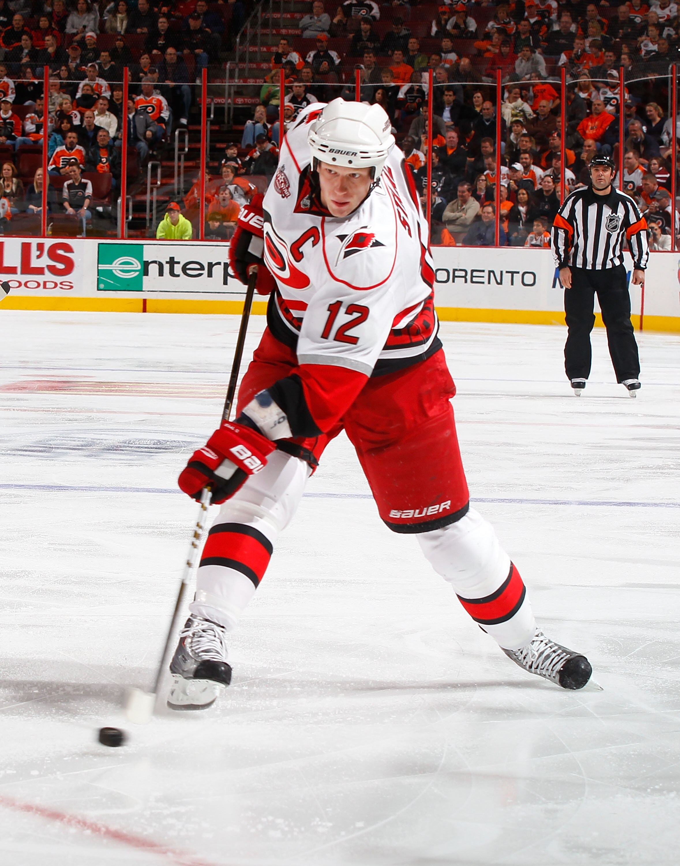 PHILADELPHIA - NOVEMBER 01:  Eric Staal #12 of the Carolina Hurricanes skates against the Philadelphia Flyers on November 1, 2010 at the Wells Fargo Center in Philadelphia, Pennsylvania. Flyers defeat the Hurricanes 3-2.  (Photo by Mike Stobe/Getty Images