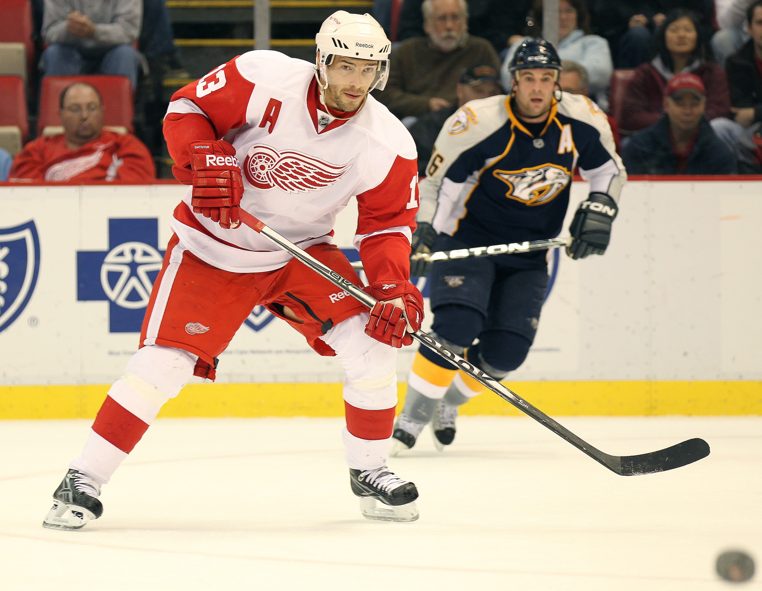 DETROIT,MI - OCTOBER 30:  Pavel Datsyuk #13 of the Detroit Red Wings waits for a puck in a game against the Nashville Predators on October 30,2010 at the Joe Louis Arena in Detroit , Michigan. The Wings defeated the Predators 5-2. (Photo by Claus Andersen