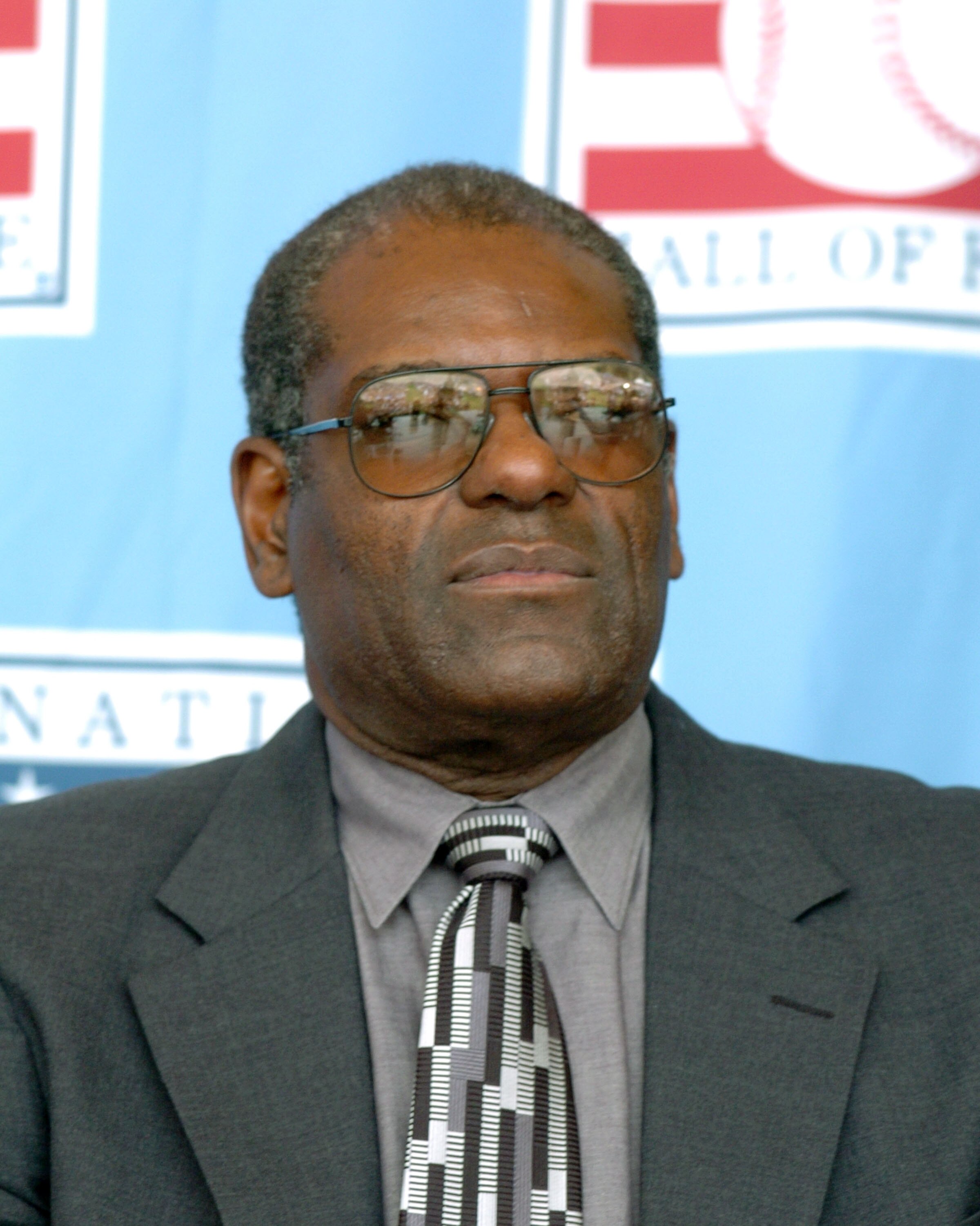 Bob Gibson watches 2004  Baseball Hall of Fame induction ceremonies  July 25, 2004 in Cooperstown, New York. (Photo by A. Messerschmidt/Getty Images) *** Local Caption ***