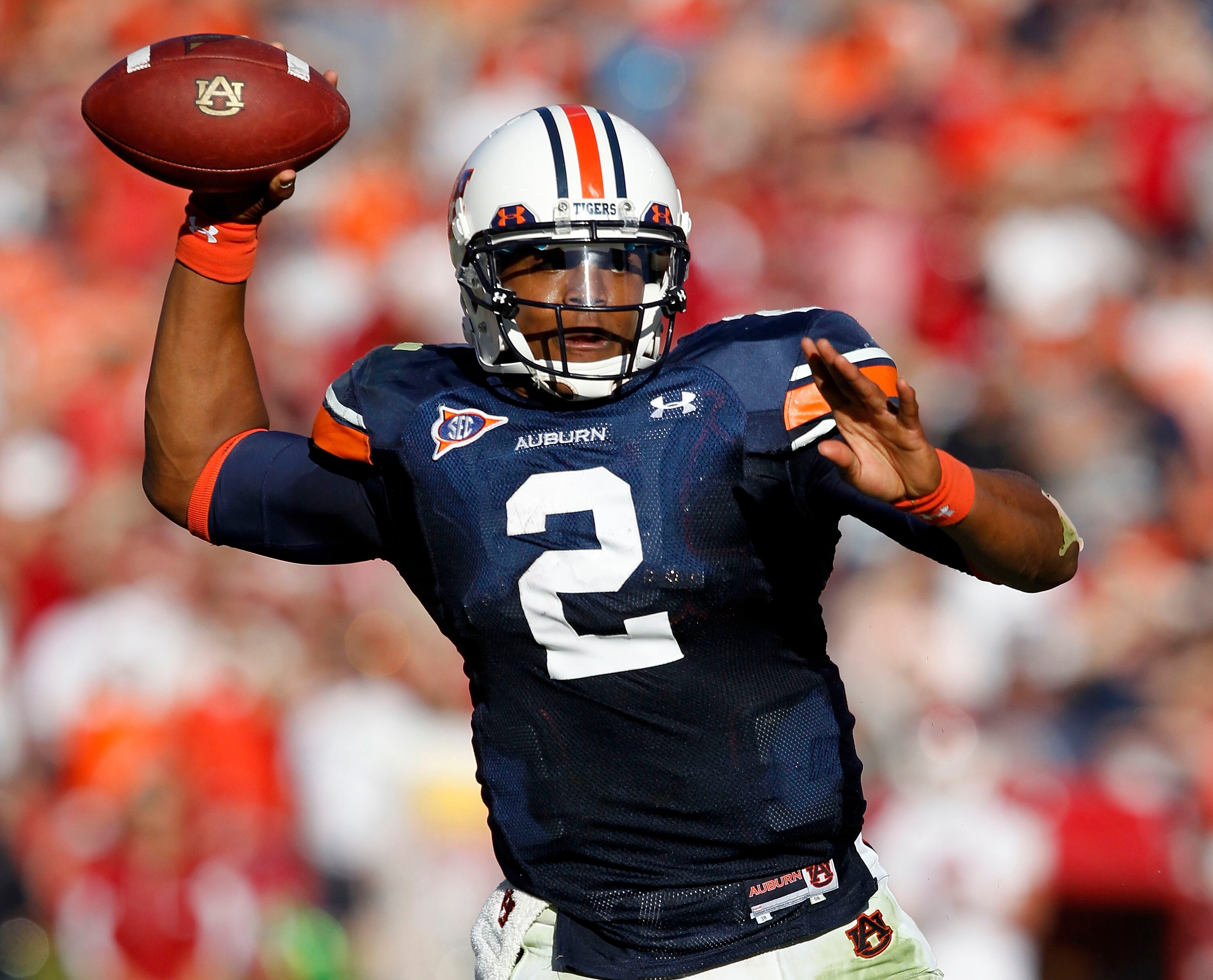 AUBURN - OCTOBER 16:  Quarterback Cam Newton #2 of the Auburn Tigers throws a pass during the game against the Arkansas Razorbacks at Jordan-Hare Stadium on October 16, 2010 in Auburn, Alabama.  (Photo by Mike Zarrilli/Getty Images)
