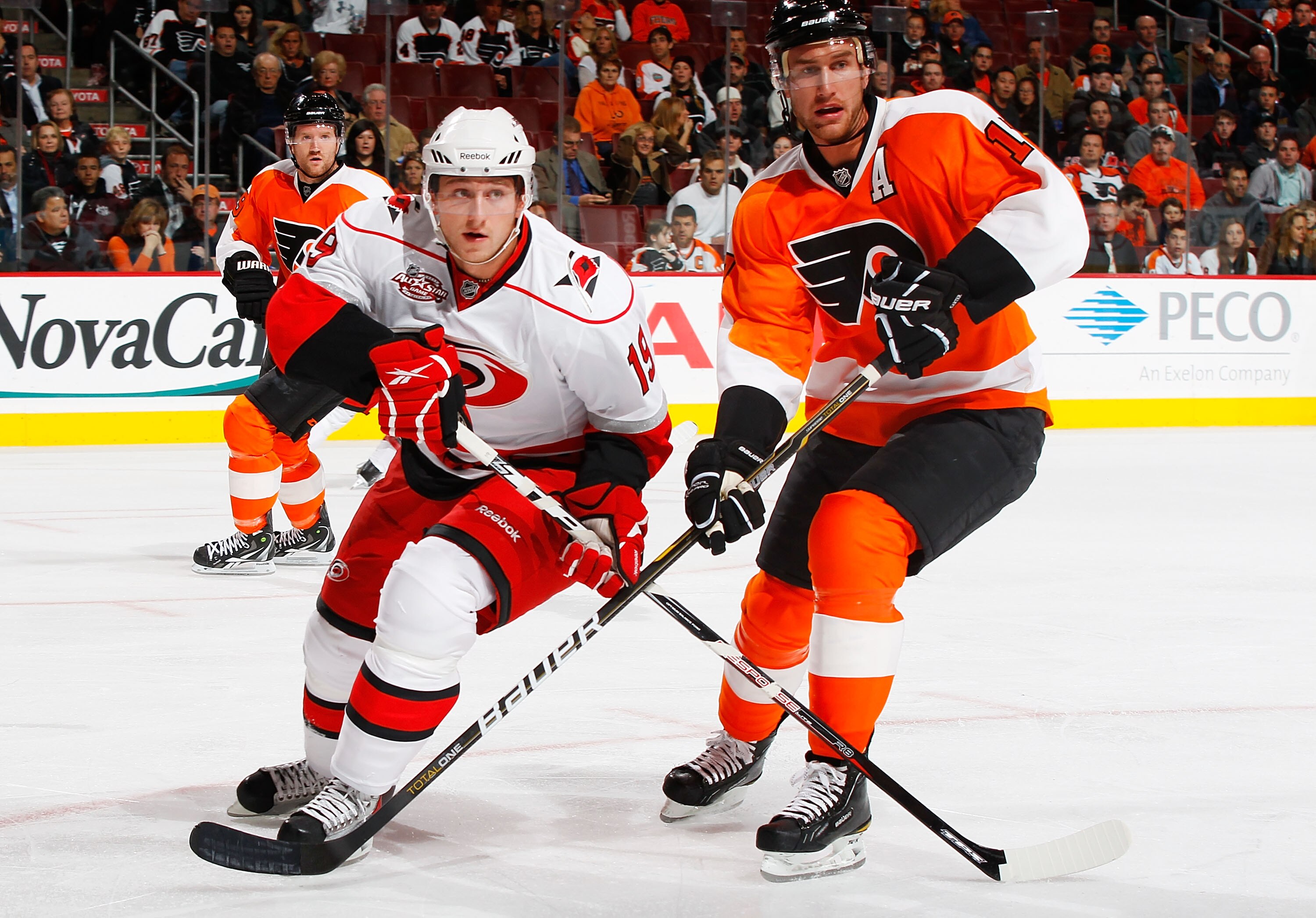 PHILADELPHIA - NOVEMBER 01:  Jeff Carter #17 of the Philadelphia Flyers battles for position against Jiri Tlusty #19 of the Carolina Hurricanes on November 1, 2010 at the Wells Fargo Center in Philadelphia, Pennsylvania. Flyers defeat the Hurricanes 3-2.