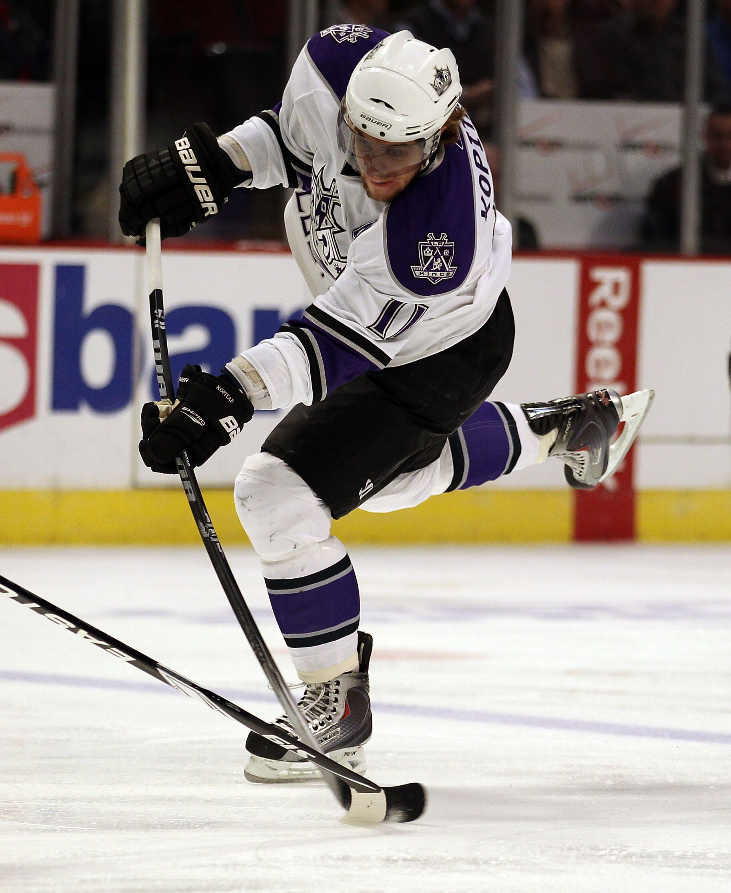 CHICAGO - OCTOBER 27: Anze Kopitar #11 of the Los Angeles Kings fires a shot against the Chicago Blackhawks at the United Center on October 27, 2010 in Chicago, Illinois. The Blackhawks defeated the Kings 3-1. (Photo by Jonathan Daniel/Getty Images)