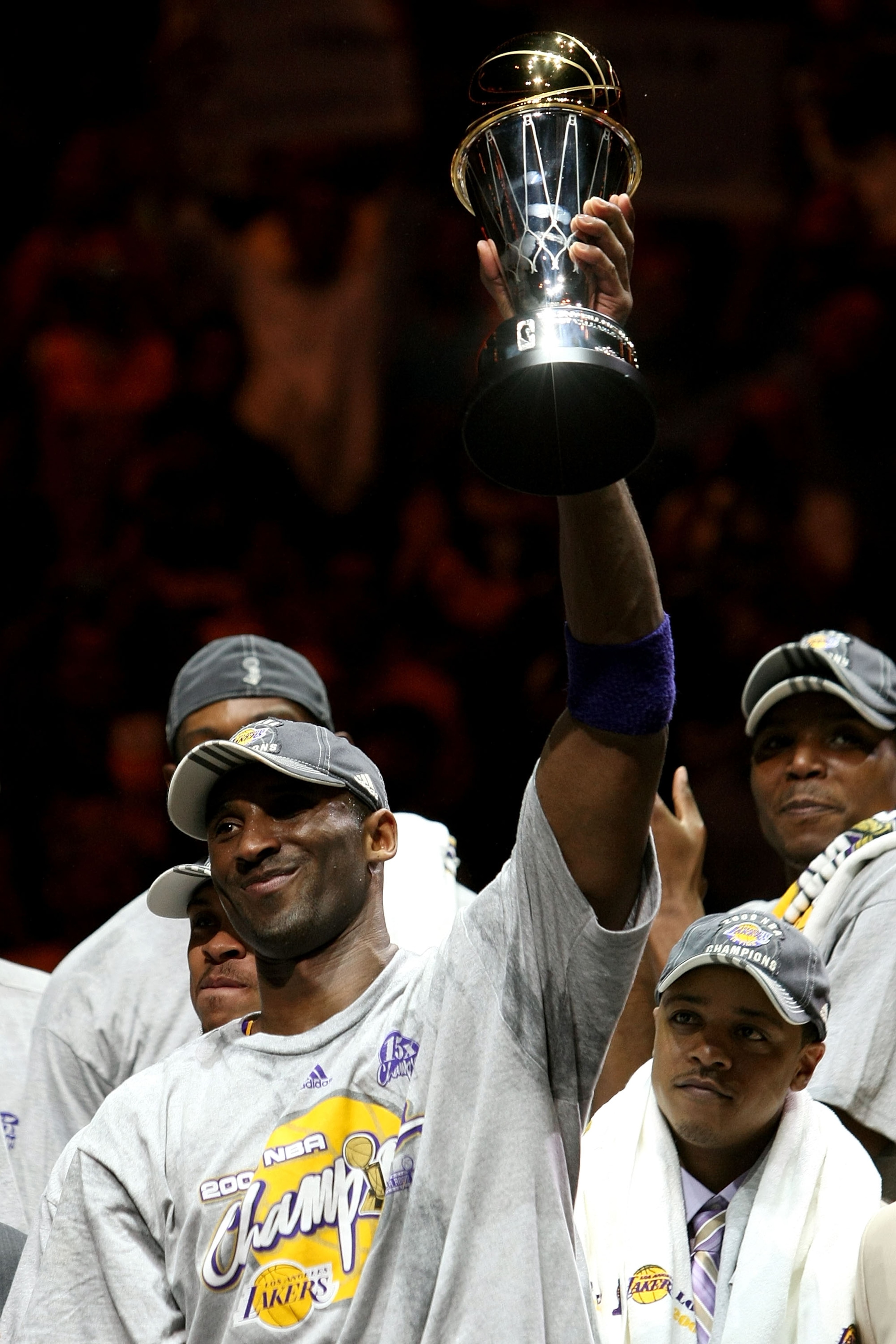 ORLANDO, FL - JUNE 14:  Kobe Bryant #24 of the Los Angeles Lakers holds up the Bill Russell MVP trophy after the Lakers defeated the Orlando Magic 99-86 in Game Five of the 2009 NBA Finals on June 14, 2009 at Amway Arena in Orlando, Florida.  NOTE TO USER