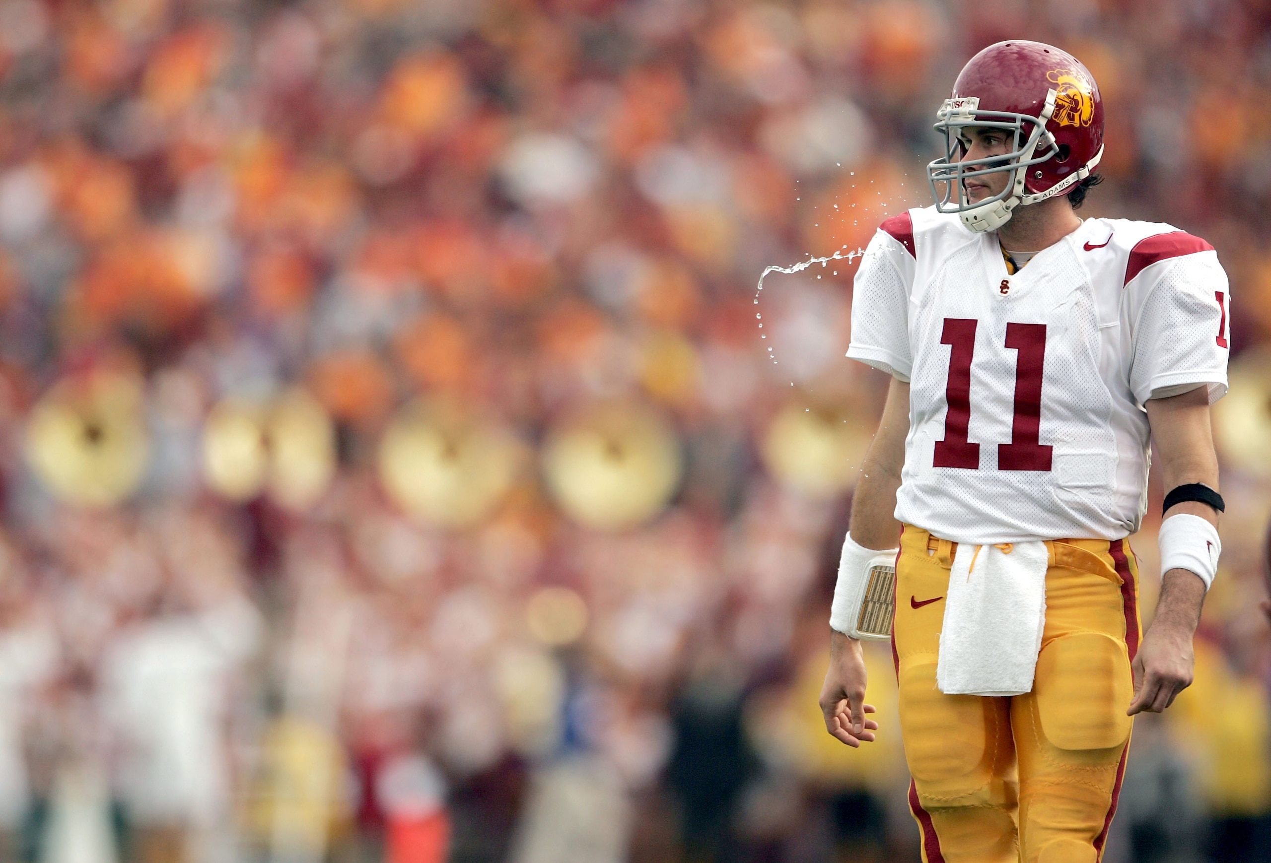 PASADENA, CA - DECEMBER 4:  Quarterback Matt Leinart #11 of the USC Trojans spits out water during the game against the UCLA Bruins on December 4, 2004 at the Rose Bowl in Pasadena, California.  (Photo by Jeff Gross/Getty Images)