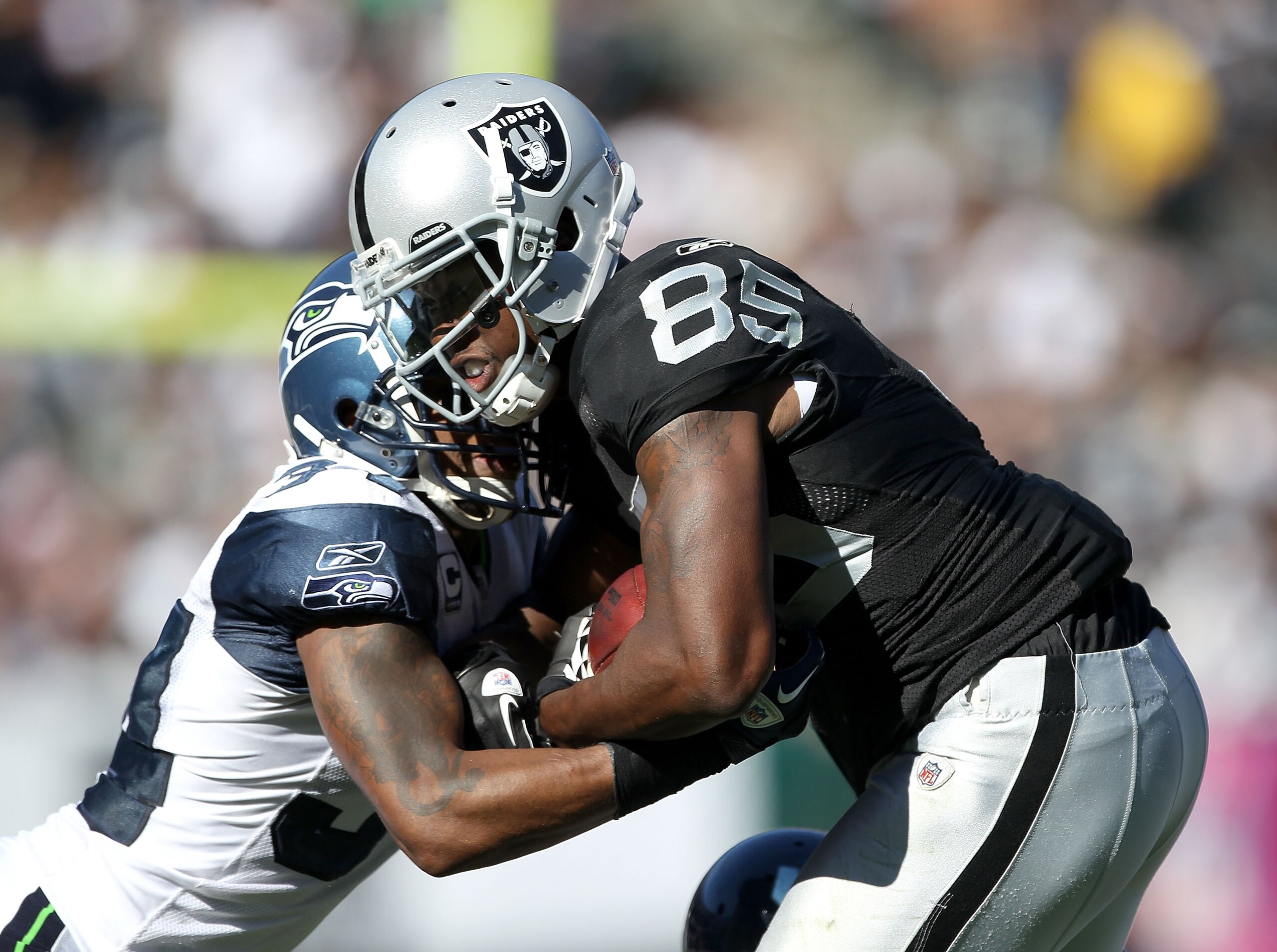OAKLAND, CA - OCTOBER 31: Darrius Heyward-Bey #85 of the Oakland Raiders is tackled by Roy Lewis #34 of the Seattle Seahawks at Oakland-Alameda County Coliseum on October 31, 2010 in Oakland, California. (Photo by Ezra Shaw/Getty Images) OAKLAND, CA - OCTOBER 31: Darrius Heyward-Bey #85 of the Oakland Raiders is tackled by Roy Lewis #34 of the Seattle Seahawks at Oakland-Alameda County Coliseum on October 31, 2010 in Oakland, California. (Photo by Ezra Shaw/Getty Images)