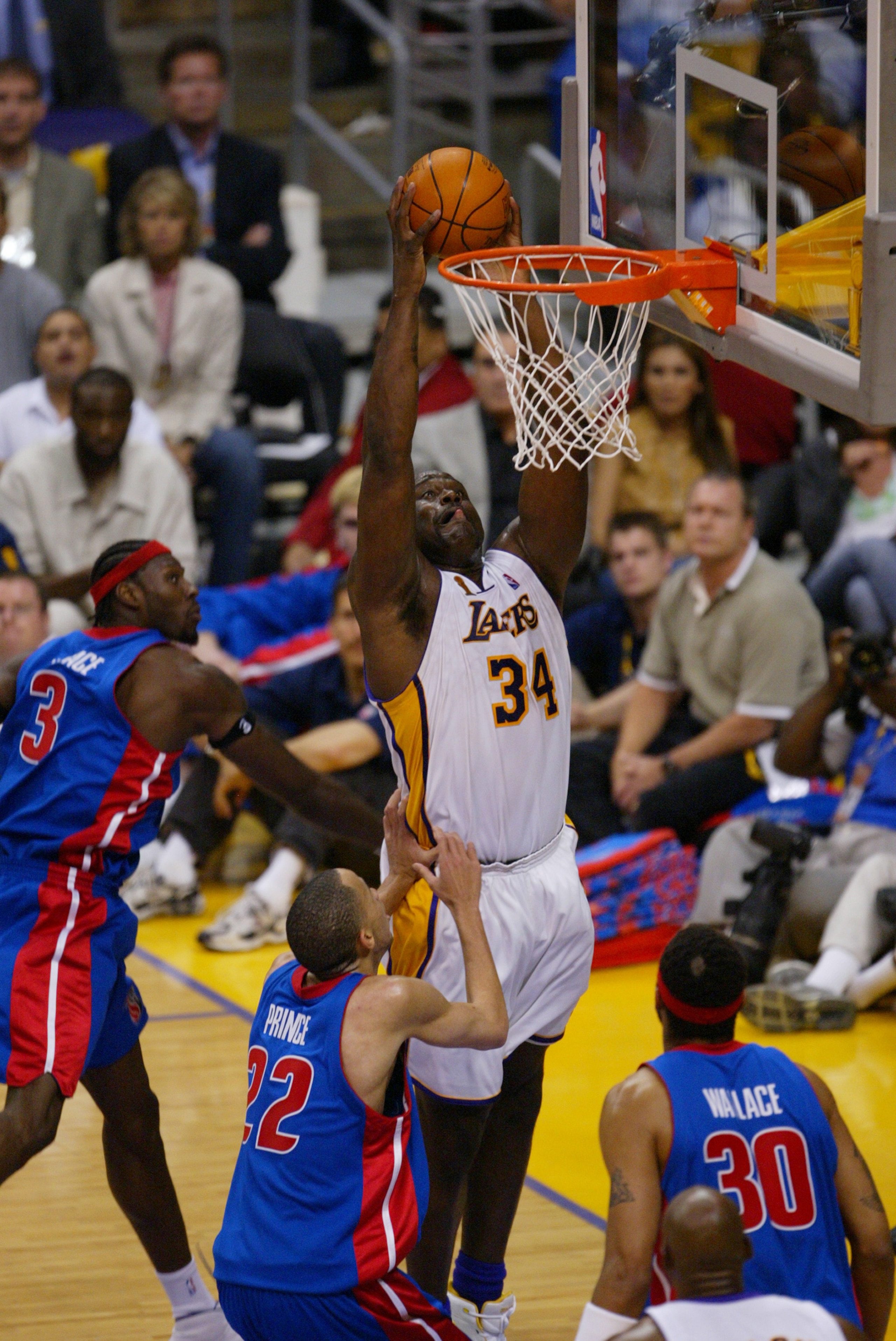 LOS ANGELES - JUNE 6:  Shaquille O'Neal #34 of the Los Angeles Lakers shoots over Tayshaun Prince #22 of the Detroit Pistons in Game 1 of the 2004 NBA Finals at Staples Center on June 6, 2004 in Los Angeles, California.  The Pistons won 87-75.  NOTE TO US