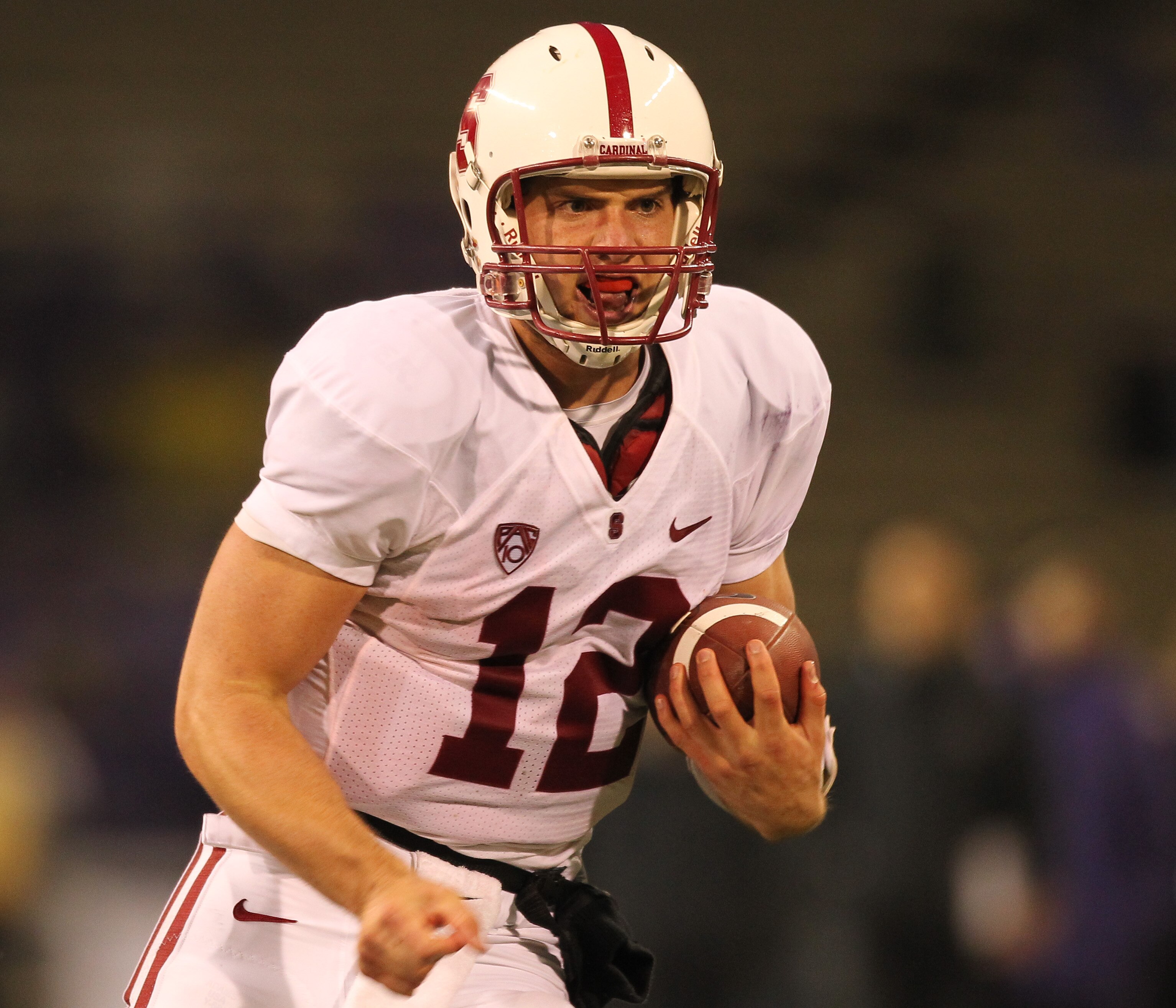 SEATTLE - OCTOBER 30:  Quarterback Andrew Luck #12 of the Stanford Cardinal rushes against the Washington Huskies on October 30, 2010 at Husky Stadium in Seattle, Washington. Stanford won 41-0. (Photo by Otto Greule Jr/Getty Images)