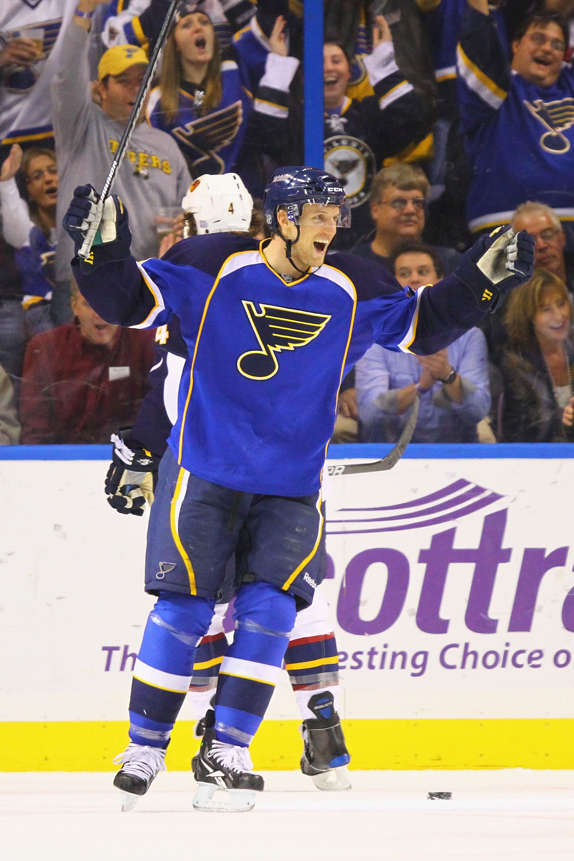 ST. LOUIS - OCTOBER 30: Jay McClement #18 of the St. Louis Blues celebrates his second of three goals against the Atlanta Thrashers at the Scottrade Center on October 30, 2010 in St. Louis, Missouri.  The Blues beat the Thrashers 4-3 in a shootout.  (Phot