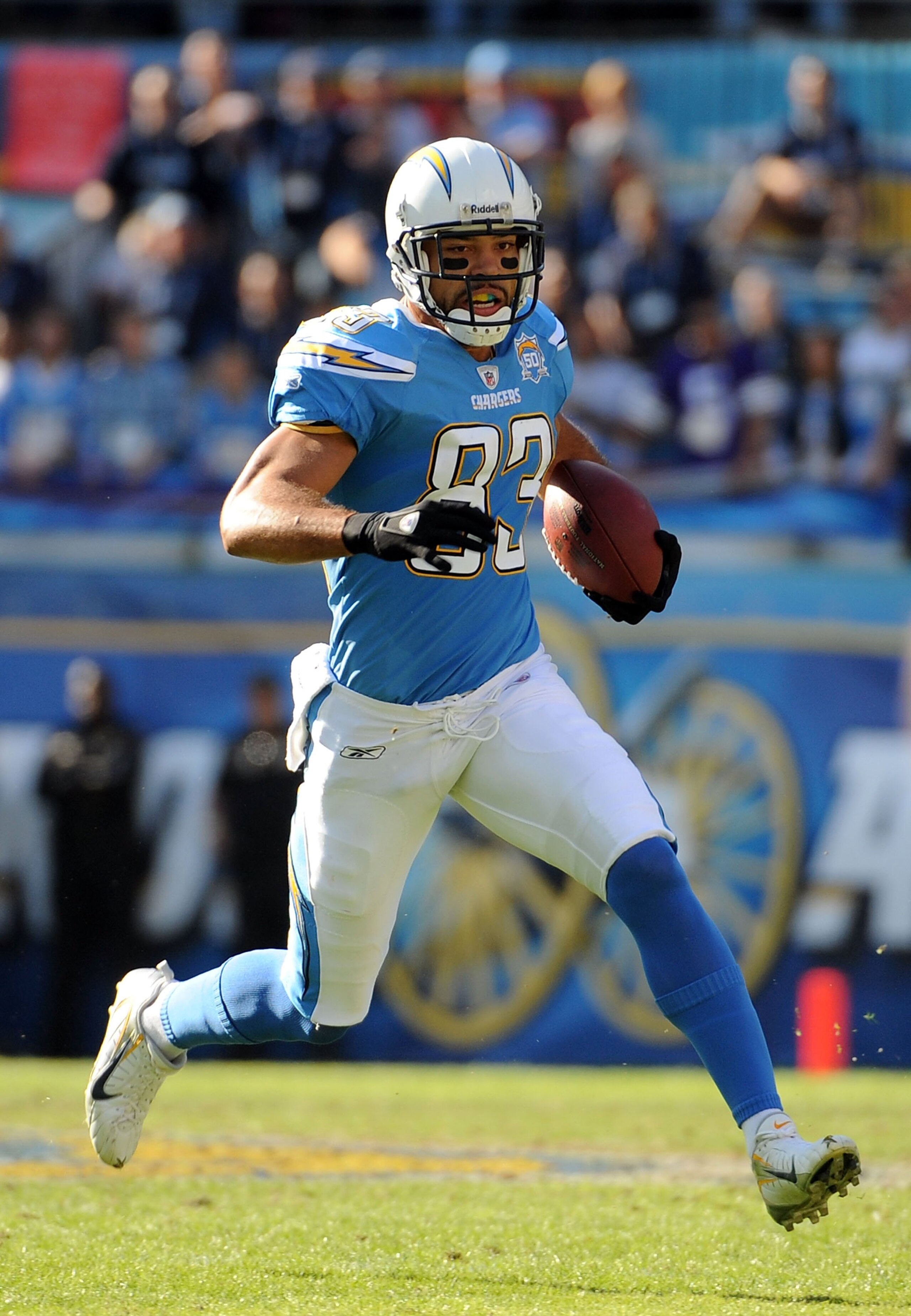 SAN DIEGO - NOVEMBER 29:  Vincent Jackson #83 of the San Diego Chargers runs after a catch against the Kansas City Chiefs during the game at Qualcomm Stadium on November 29, 2009 in San Diego, California.  (Photo by Harry How/Getty Images)