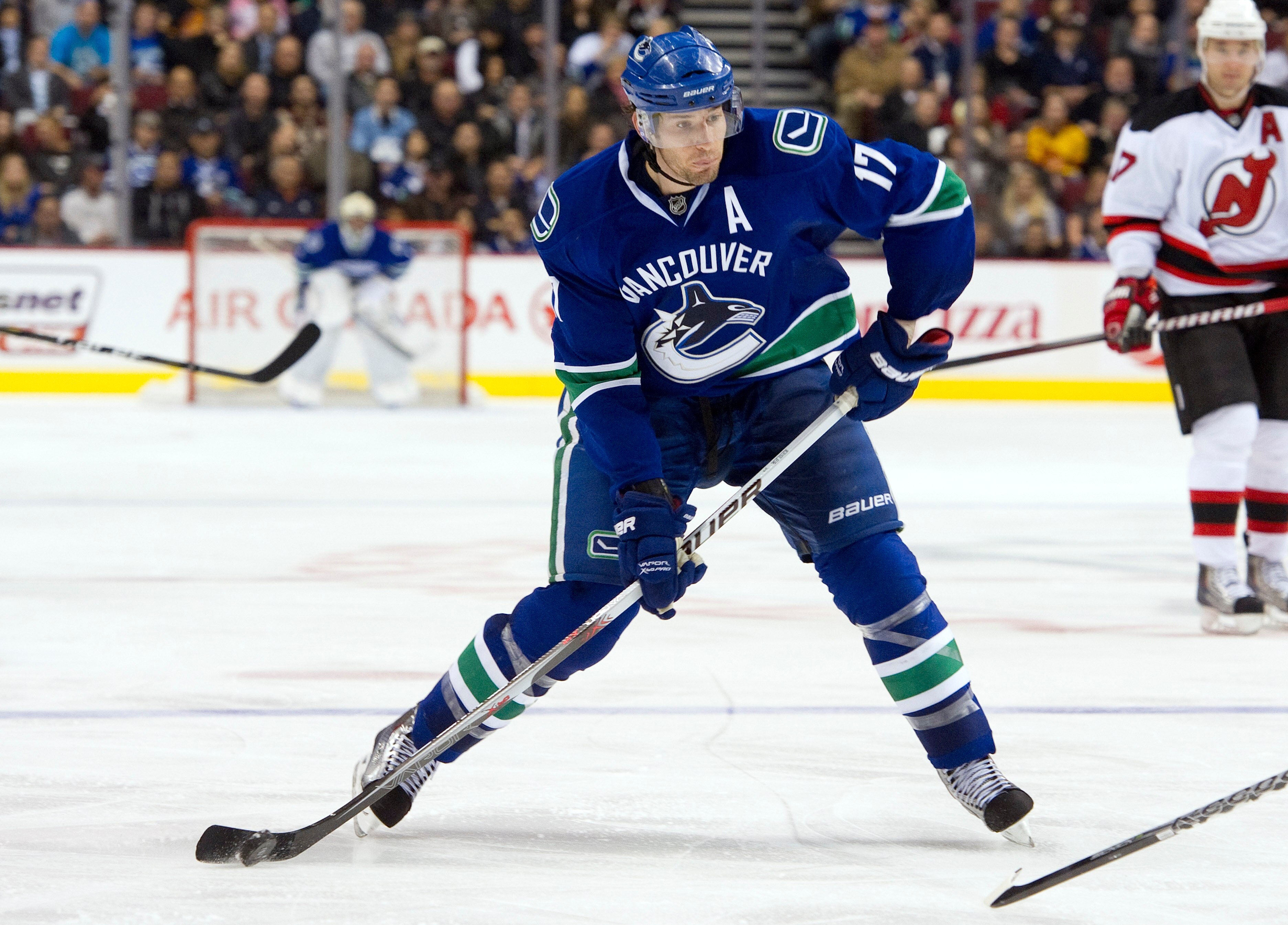 VANCOUVER, CANADA - NOVEMBER 1: Ryan Kesler #17 of the Vancouver Canucks fires a shot towards the net during NHL action against the New Jersey Devils on November 01, 2010 at Rogers Arena in Vancouver, British Columbia, Canada.  (Photo by Rich Lam/Getty Im