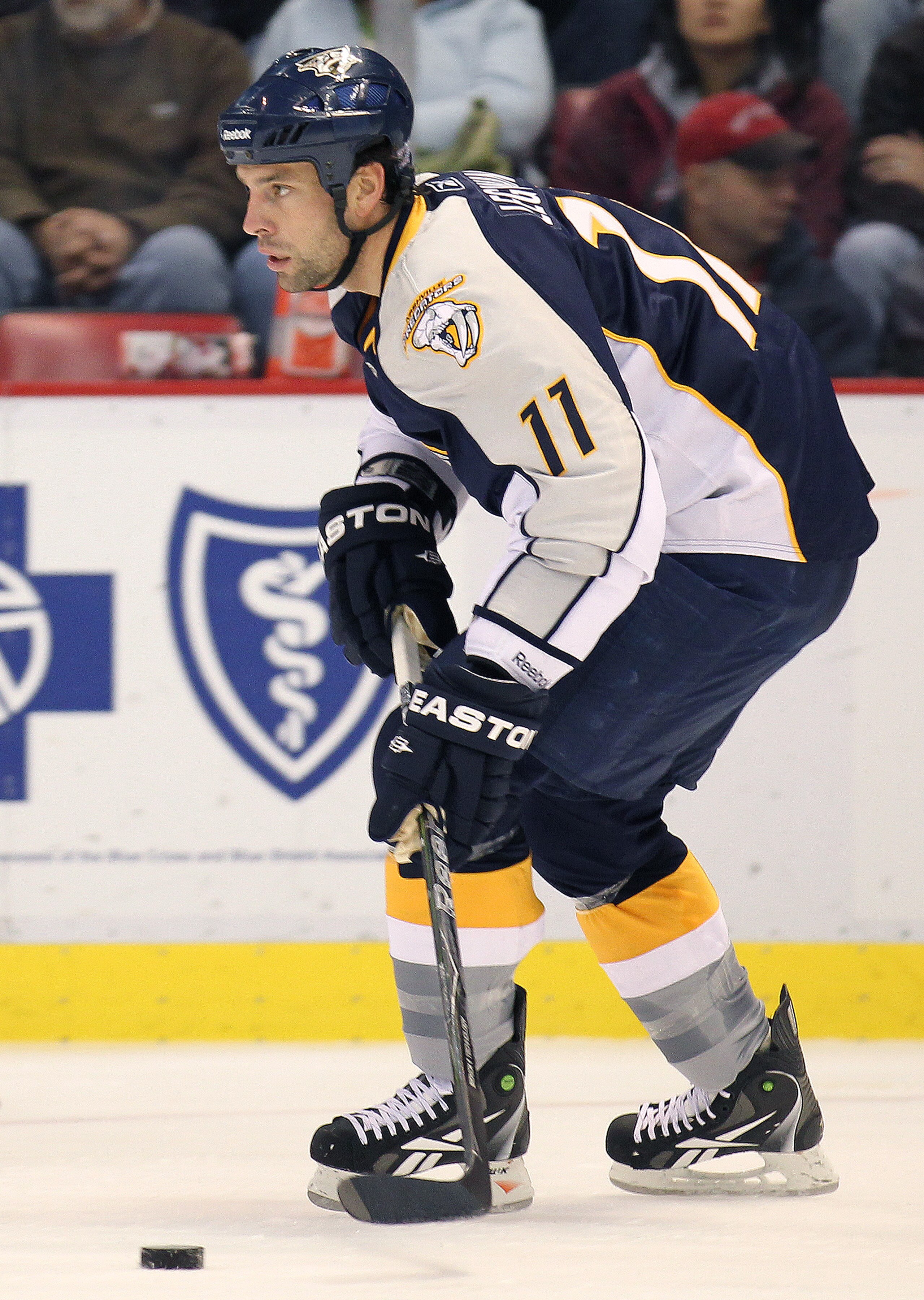 DETROIT,MI - OCTOBER 30:  David Legwand #11 of the Nashville Predators skates with the puck in a game against the Detroit Red Wings on October 30,2010 at the Joe Louis Arena in Detroit , Michigan. The Wings defeated the Predators 5-2. (Photo by Claus Ande