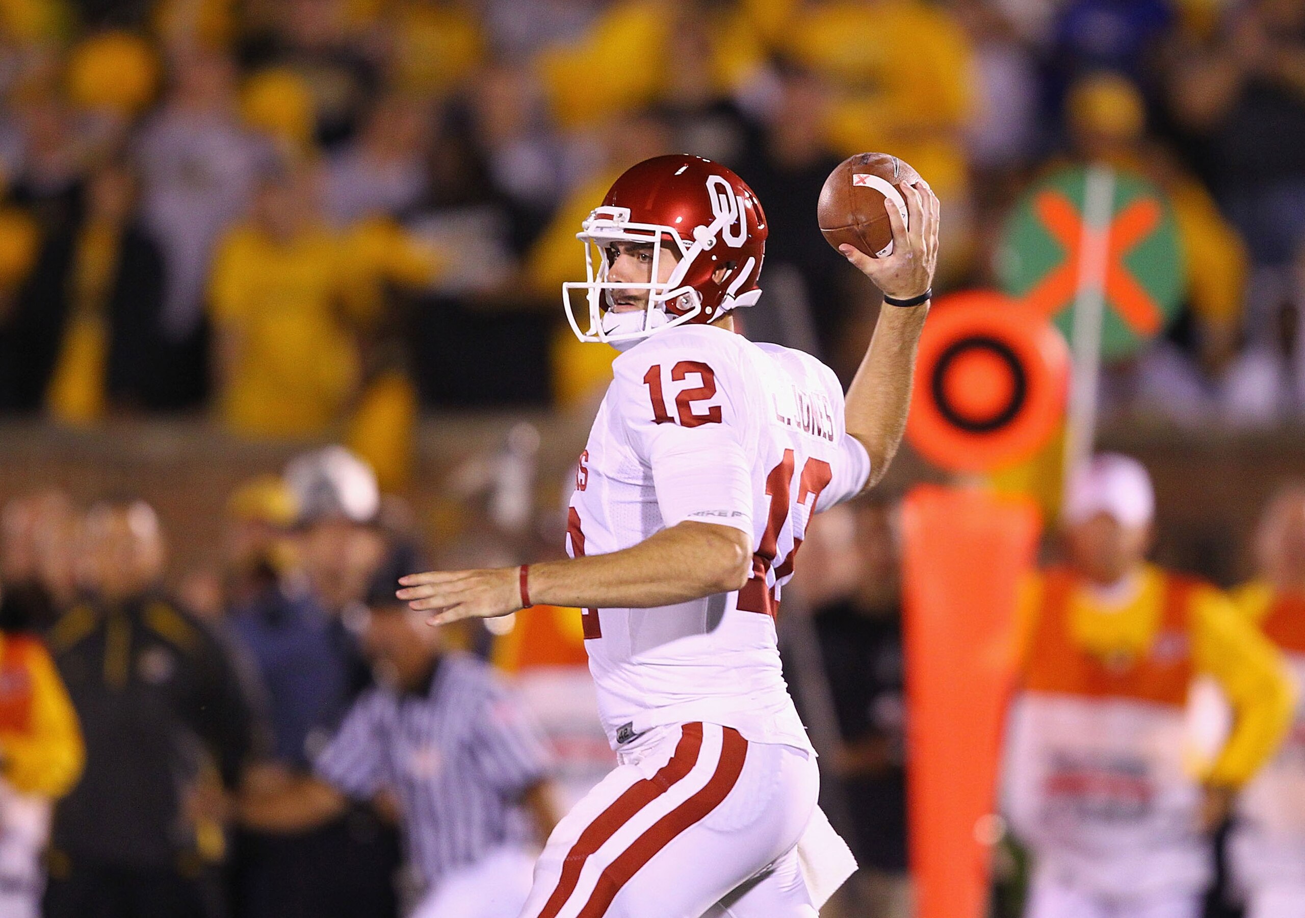 COLUMBIA, MO - OCTOBER 23: Landry Jones #12 of the Oklahoma Sooners in action against the Missouri Tigers at Faurot Field/Memorial Stadium on October 23, 2010 in Columbia, Missouri.  The Tigers beat the Sooners 36-27.  (Photo by Dilip Vishwanat/Getty Imag