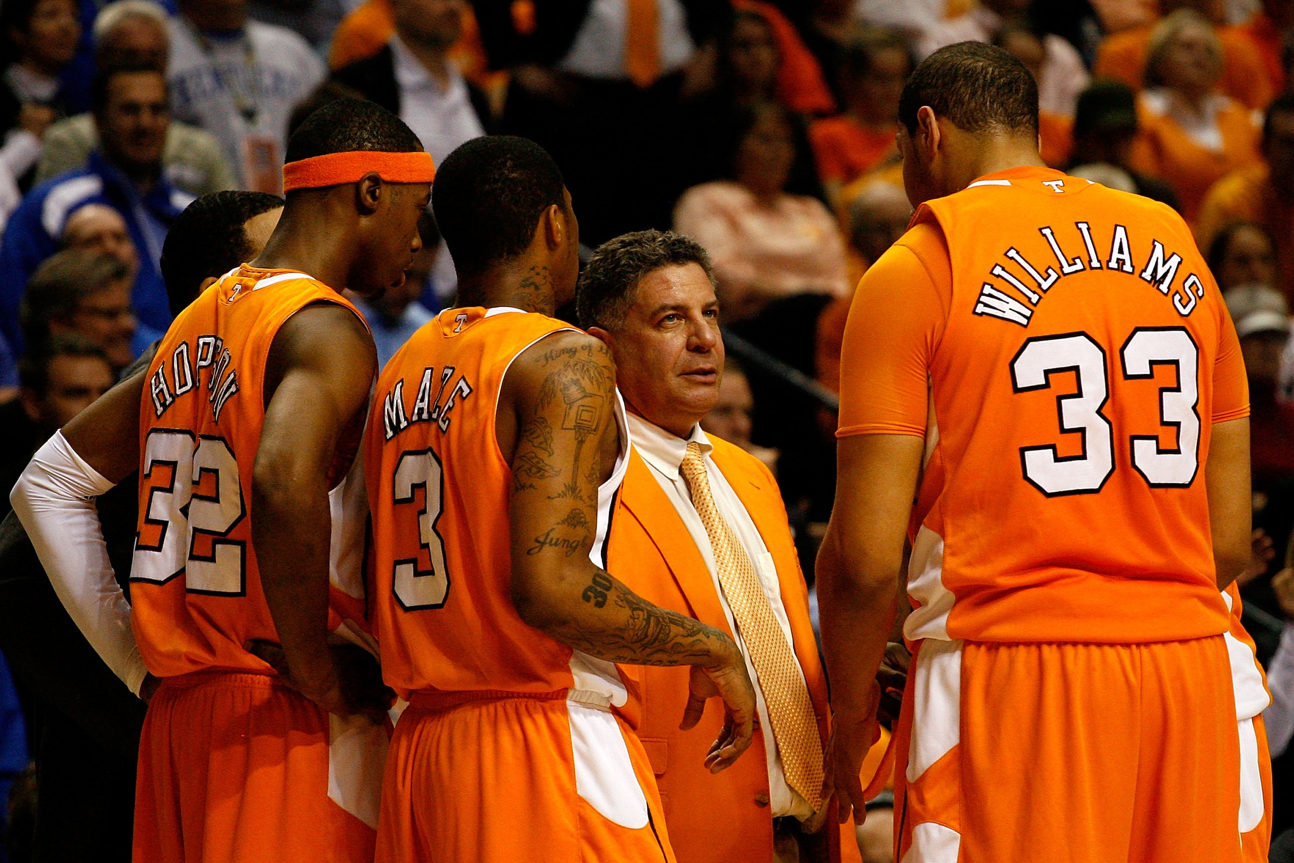NASHVILLE, TN - MARCH 13: Head coach Bruce Pearl of the Tennessee Volunteers talks with Scotty Hopson #32, Bobby Maze #3 and Brian Williams #33 against the Kentucky Wildcats during the semirfinals of the SEC Men's Basketball Tournament at the Bridgestone NASHVILLE, TN - MARCH 13: Head coach Bruce Pearl of the Tennessee Volunteers talks with Scotty Hopson #32, Bobby Maze #3 and Brian Williams #33 against the Kentucky Wildcats during the semirfinals of the SEC Men's Basketball Tournament at the Bridgestone