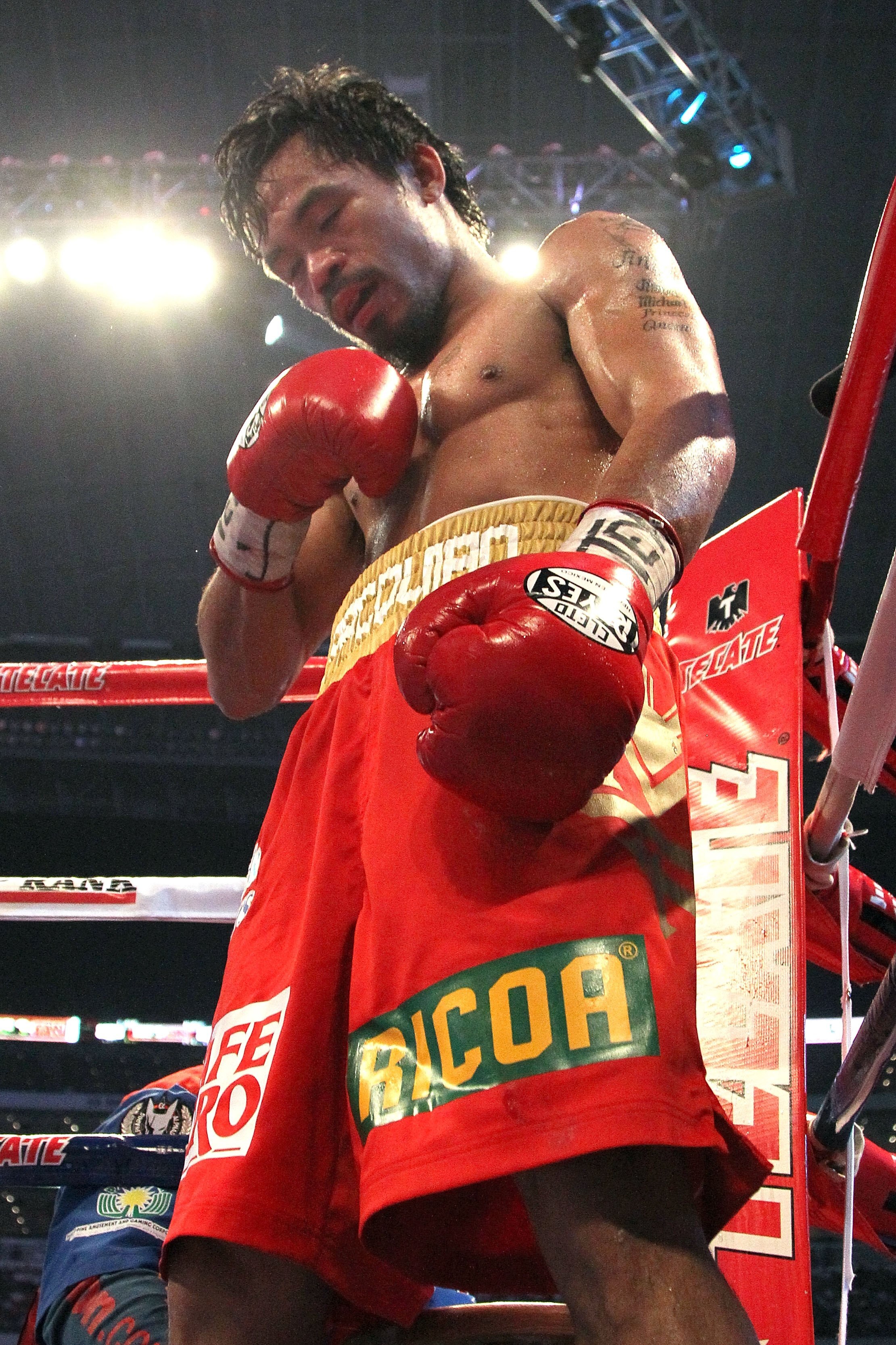 ARLINGTON, TX - MARCH 13:  Manny Pacquiao of the Philippines looks on in the ring against Joshua Clottey of Ghana during the WBO welterweight title fight at Cowboys Stadium on March 13, 2010 in Arlington, Texas. Pacquiao defeated Clottey by unanimous deci