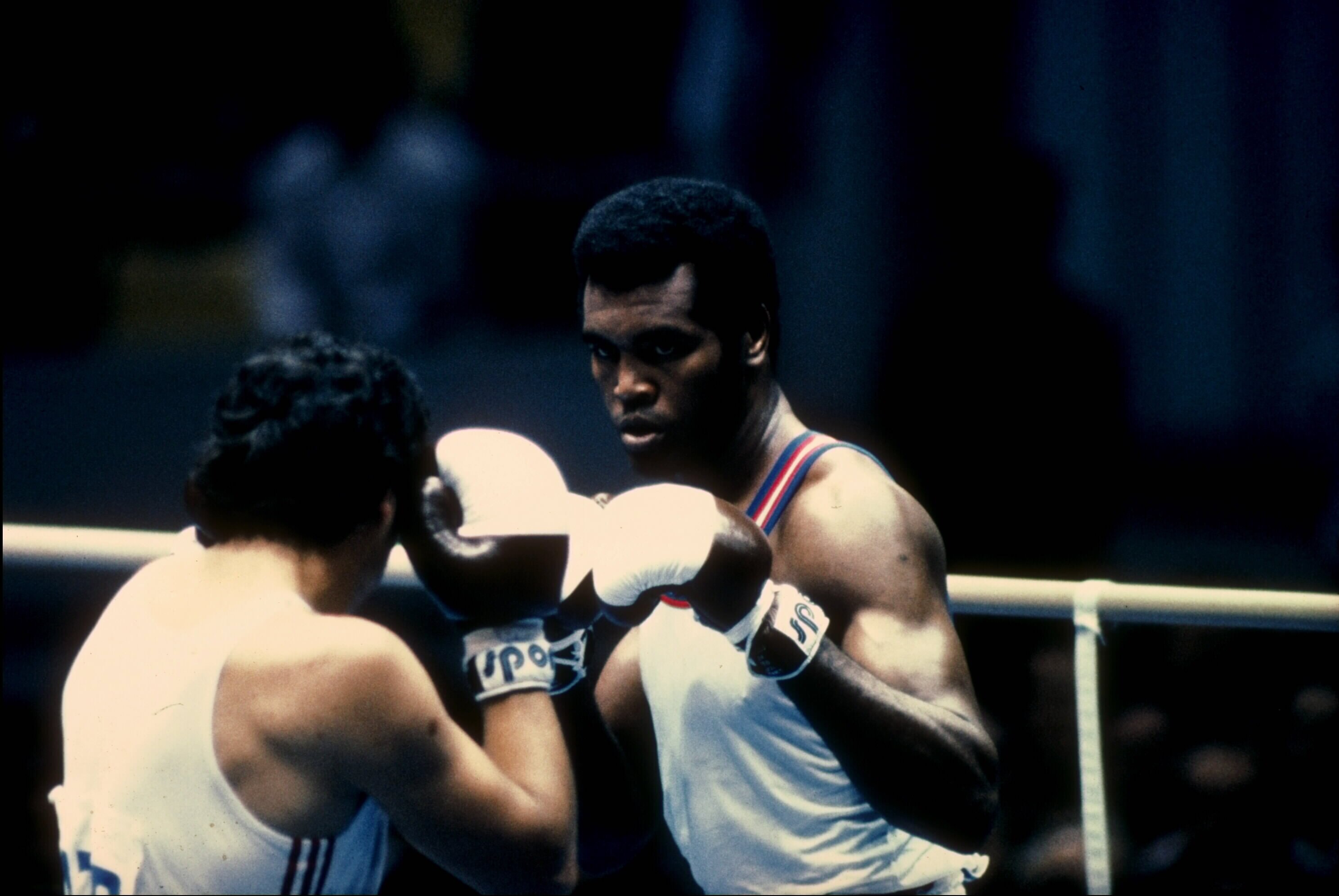 1980:  Teofilo Stevenson of Cuba (right) focuses intently on his opponent during a heavy weight bout in the 1980 Summer Olympic Games held in Moscow, USSR.  Stevenson was victourious throughout his bracket as he won his third consecutive gold medal in the