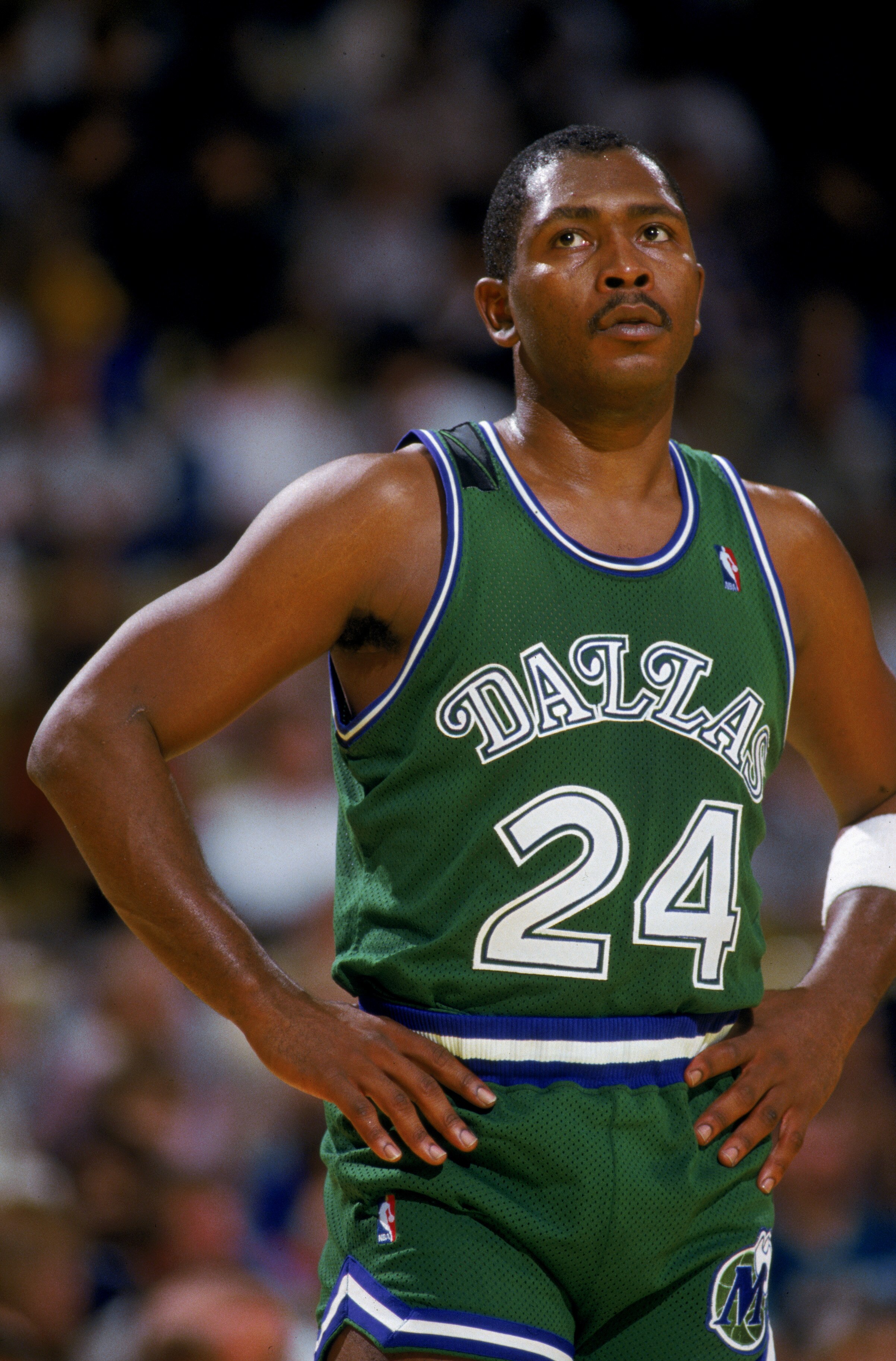 LOS ANGELES - 1987:  Mark Aguirre #24 of the Dallas Mavericks stands on the court during the NBA game against the Los Angeles Lakers at the Great Western Forum in Los Angeles, California in 1987.  (Photo by Stephen Dunn/Getty Images)