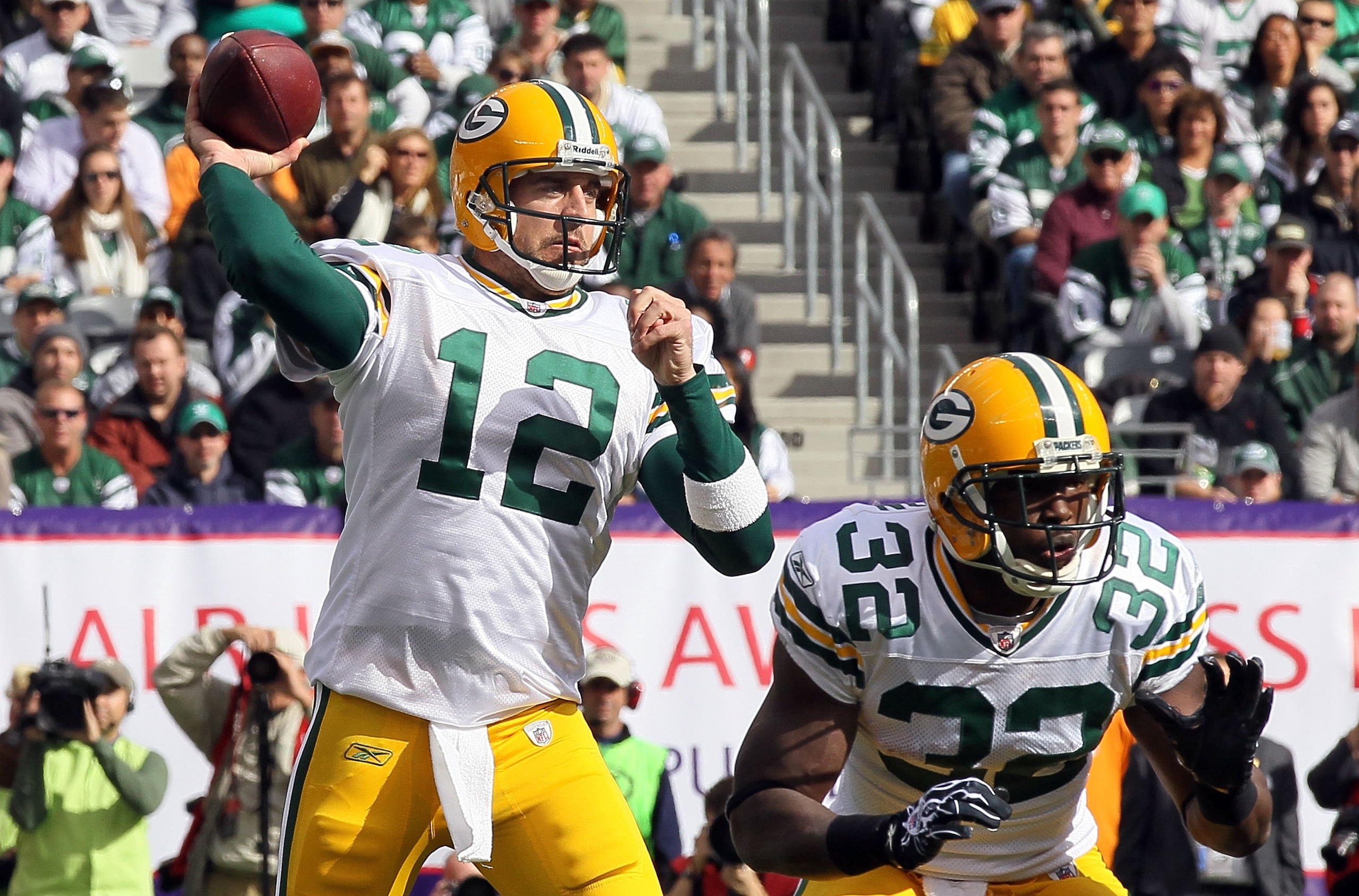 EAST RUTHERFORD, NJ - OCTOBER 31:  Aaron Rodgers #12 of the Green Bay Packers throws a pass against the New York Jets on October 31, 2010 at the New Meadowlands Stadium in East Rutherford, New Jersey.The Packers defeated the Jets 9-0.  (Photo by Jim McIsa