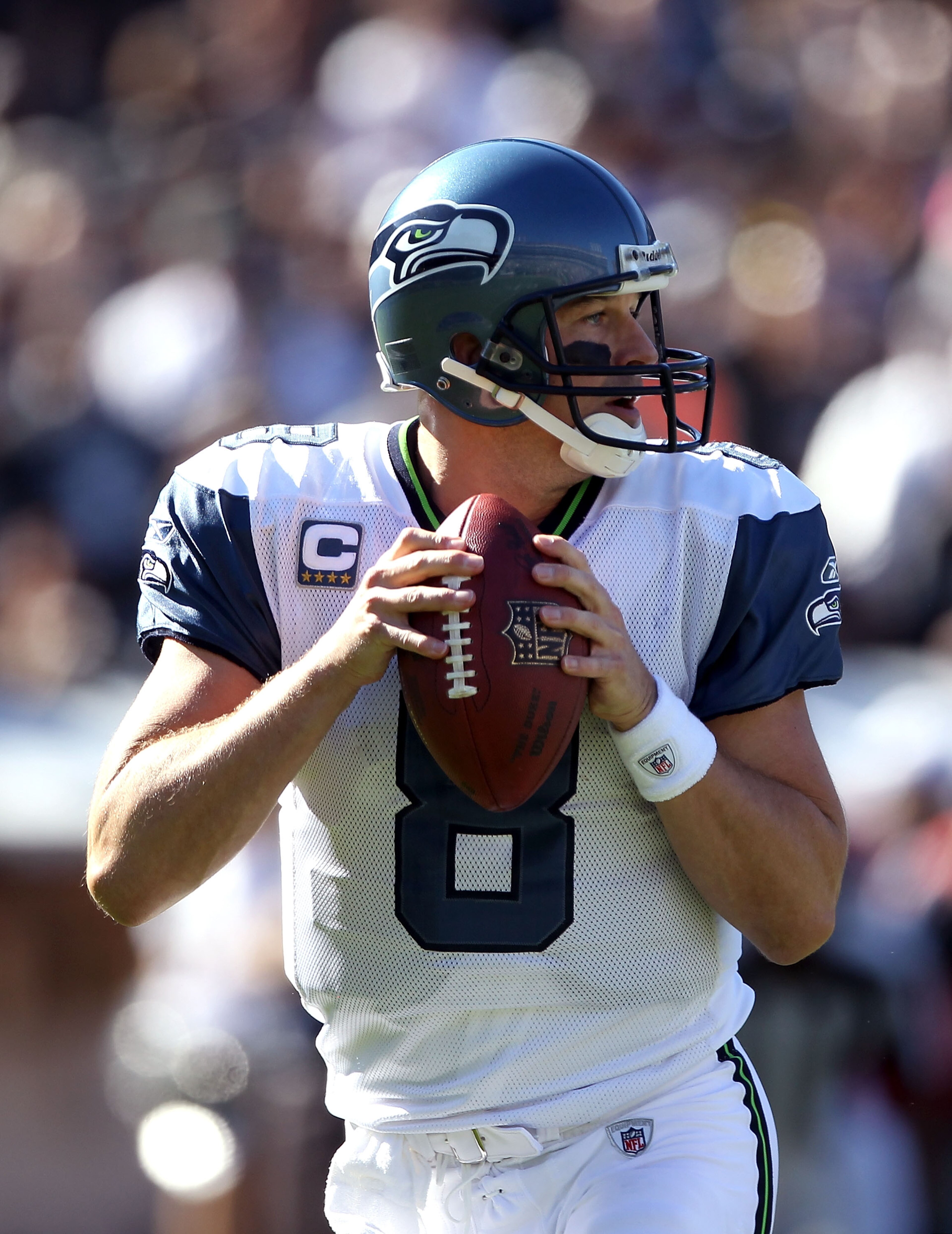 OAKLAND, CA - OCTOBER 31: Matt Hasselbeck #8 of the Seattle Seahawks drops back to pass against the Oakland Raiders at Oakland-Alameda County Coliseum on October 31, 2010 in Oakland, California. (Photo by Ezra Shaw/Getty Images) OAKLAND, CA - OCTOBER 31: Matt Hasselbeck #8 of the Seattle Seahawks drops back to pass against the Oakland Raiders at Oakland-Alameda County Coliseum on October 31, 2010 in Oakland, California. (Photo by Ezra Shaw/Getty Images)