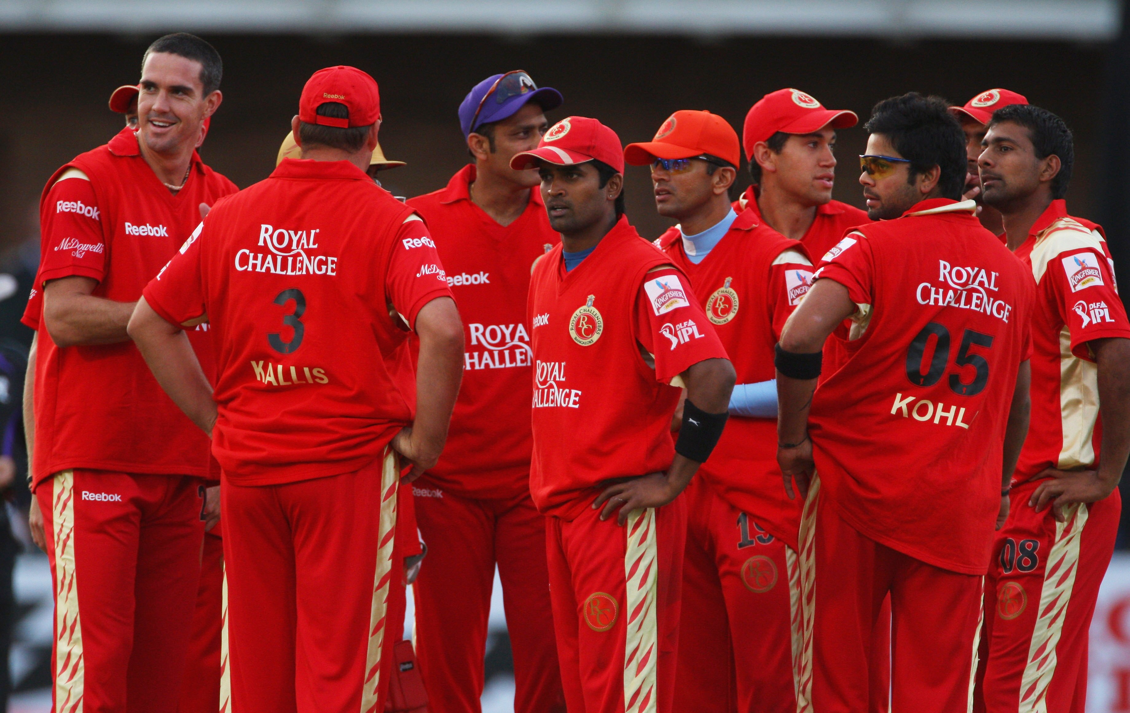 PORT ELIZABETH, SOUTH AFRICA - APRIL 20:  Kevin Pietersen of Bangalore  (L) looks at the big screen with his team during IPL T20 match between Chennai Super Kings and Royal Challengers Bangalore at St Georges Cricket Ground on April 20, 2009 in Port Eliza