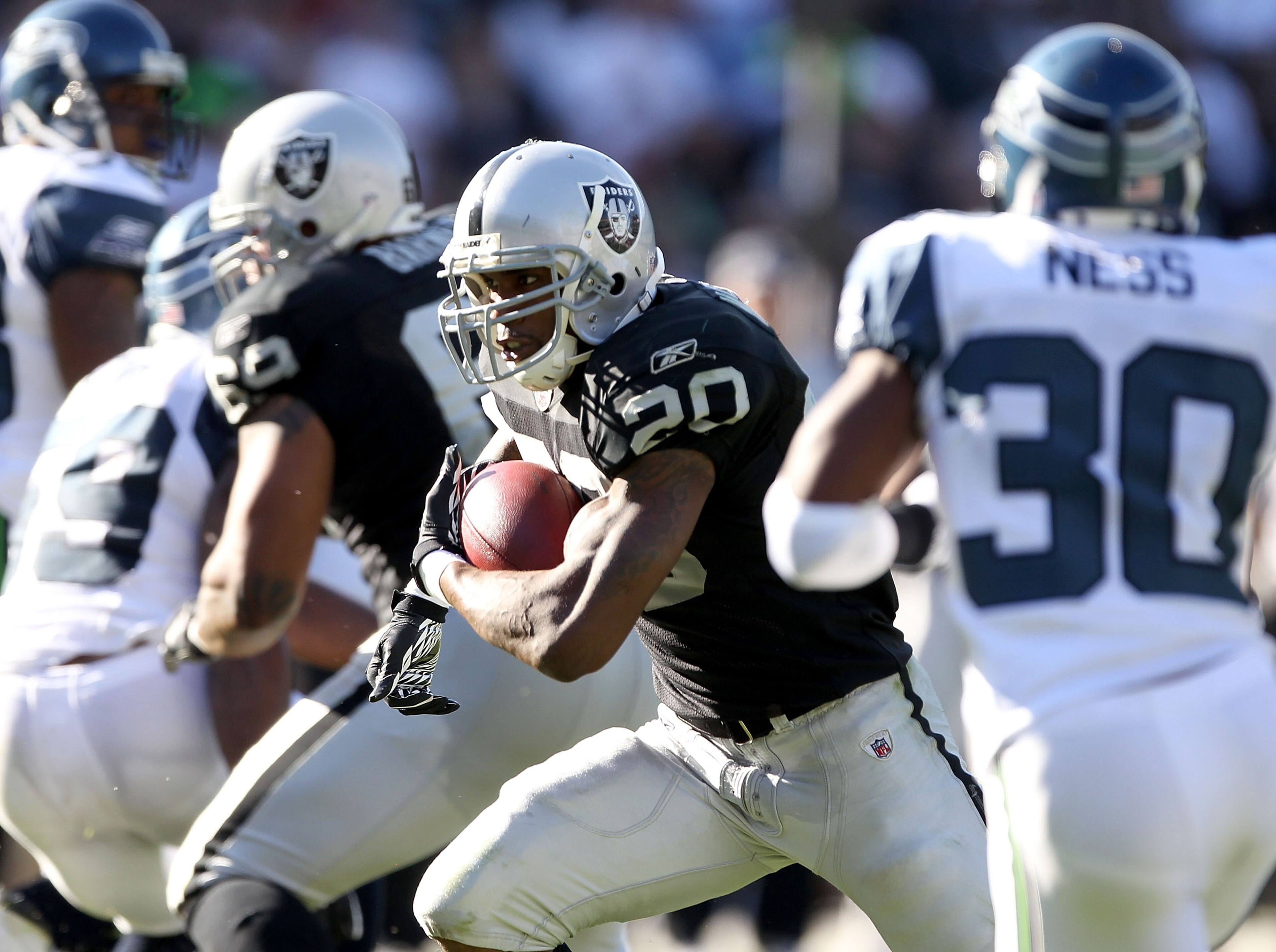 OAKLAND, CA - OCTOBER 31: Darren McFadden #20 of the Oakland Raiders runs with the ball against the Seattle Seahawks at Oakland-Alameda County Coliseum on October 31, 2010 in Oakland, California. (Photo by Ezra Shaw/Getty Images) OAKLAND, CA - OCTOBER 31: Darren McFadden #20 of the Oakland Raiders runs with the ball against the Seattle Seahawks at Oakland-Alameda County Coliseum on October 31, 2010 in Oakland, California. (Photo by Ezra Shaw/Getty Images)