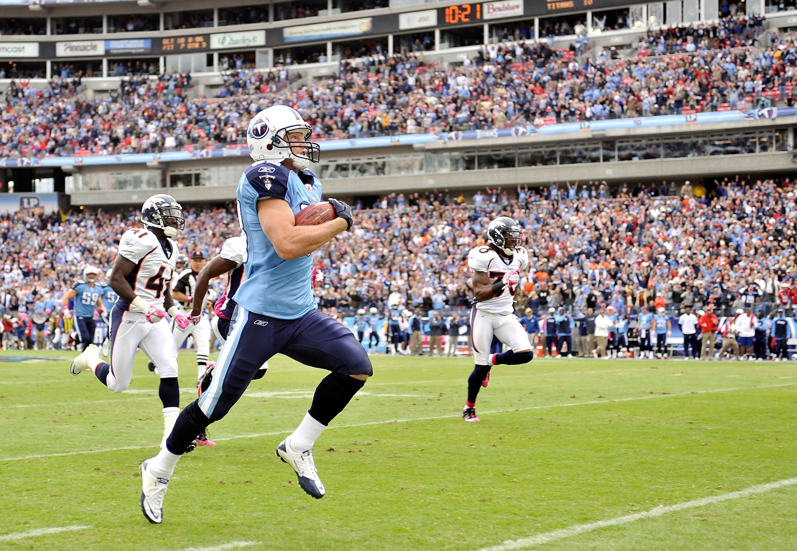 NASHVILLE, TN - OCTOBER 03: Marc Mariani #83 of the Tennessee Titans runs a kickoff back for a touchdown aganst the Denver Broncos at LP Field on October 3, 2010 in Nashville, Tennessee. Denver won 26-20. (Photo by Grant Halverson/Getty Images) NASHVILLE, TN - OCTOBER 03: Marc Mariani #83 of the Tennessee Titans runs a kickoff back for a touchdown aganst the Denver Broncos at LP Field on October 3, 2010 in Nashville, Tennessee. Denver won 26-20. (Photo by Grant Halverson/Getty Images)
