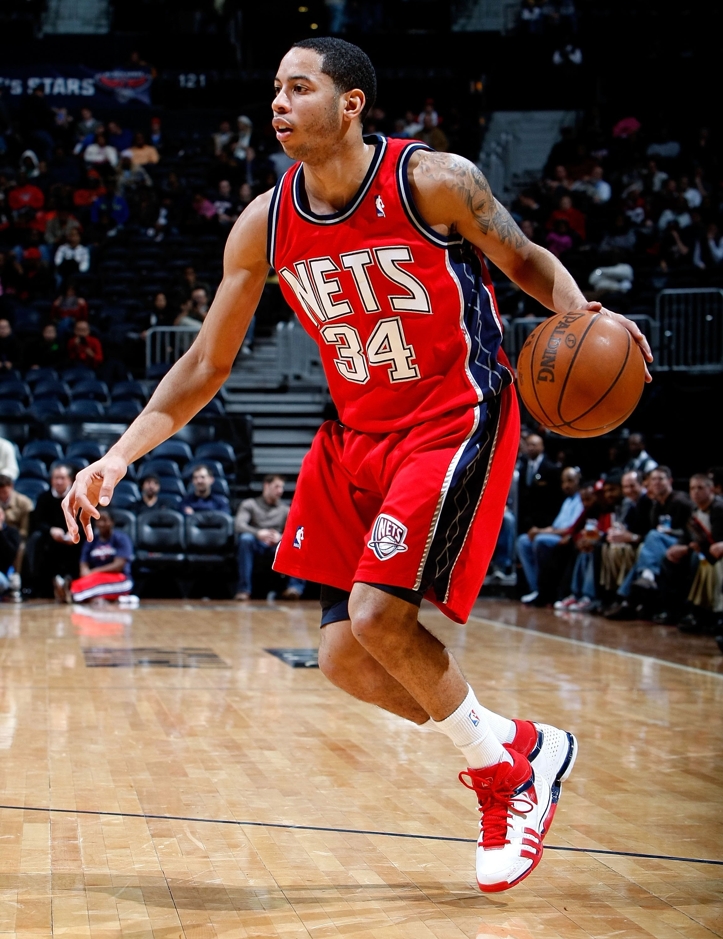 ATLANTA - JANUARY 06:  Devin Harris #34 of the New Jersey Nets against the Atlanta Hawks at Philips Arena on January 6, 2010 in Atlanta, Georgia.  NOTE TO USER: User expressly acknowledges and agrees that, by downloading and/or using this Photograph, User