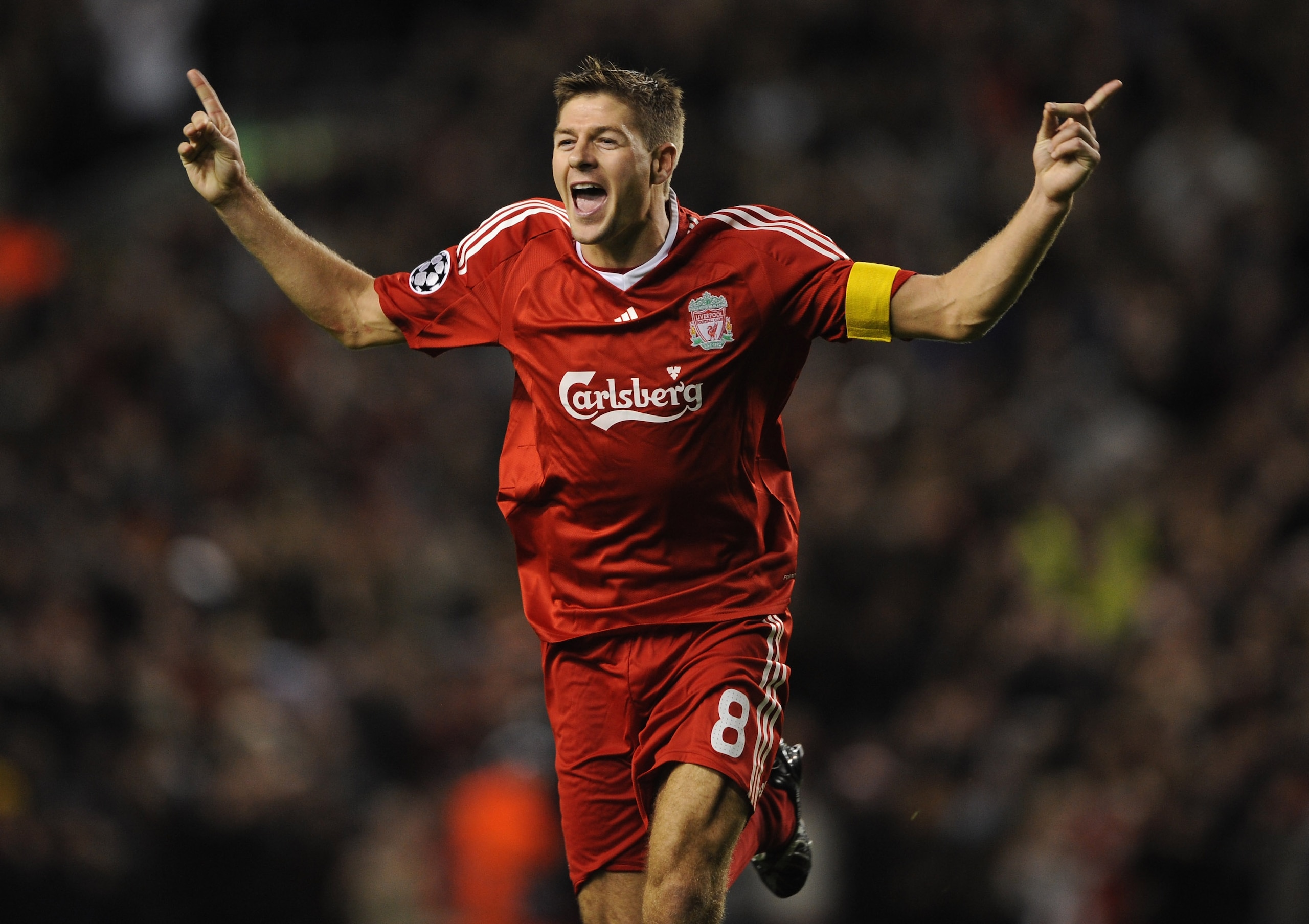 LIVERPOOL, UNITED KINGDOM - OCTOBER 01: Steven Gerrard of Liverpool celebrates scoring his team's third goal, and his 100th goal for Liverpool during the UEFA Champions League Group D match between Liverpool and PSV Eindhoven at Anfield on October 1, 200 LIVERPOOL, UNITED KINGDOM - OCTOBER 01: Steven Gerrard of Liverpool celebrates scoring his team's third goal, and his 100th goal for Liverpool during the UEFA Champions League Group D match between Liverpool and PSV Eindhoven at Anfield on October 1, 200