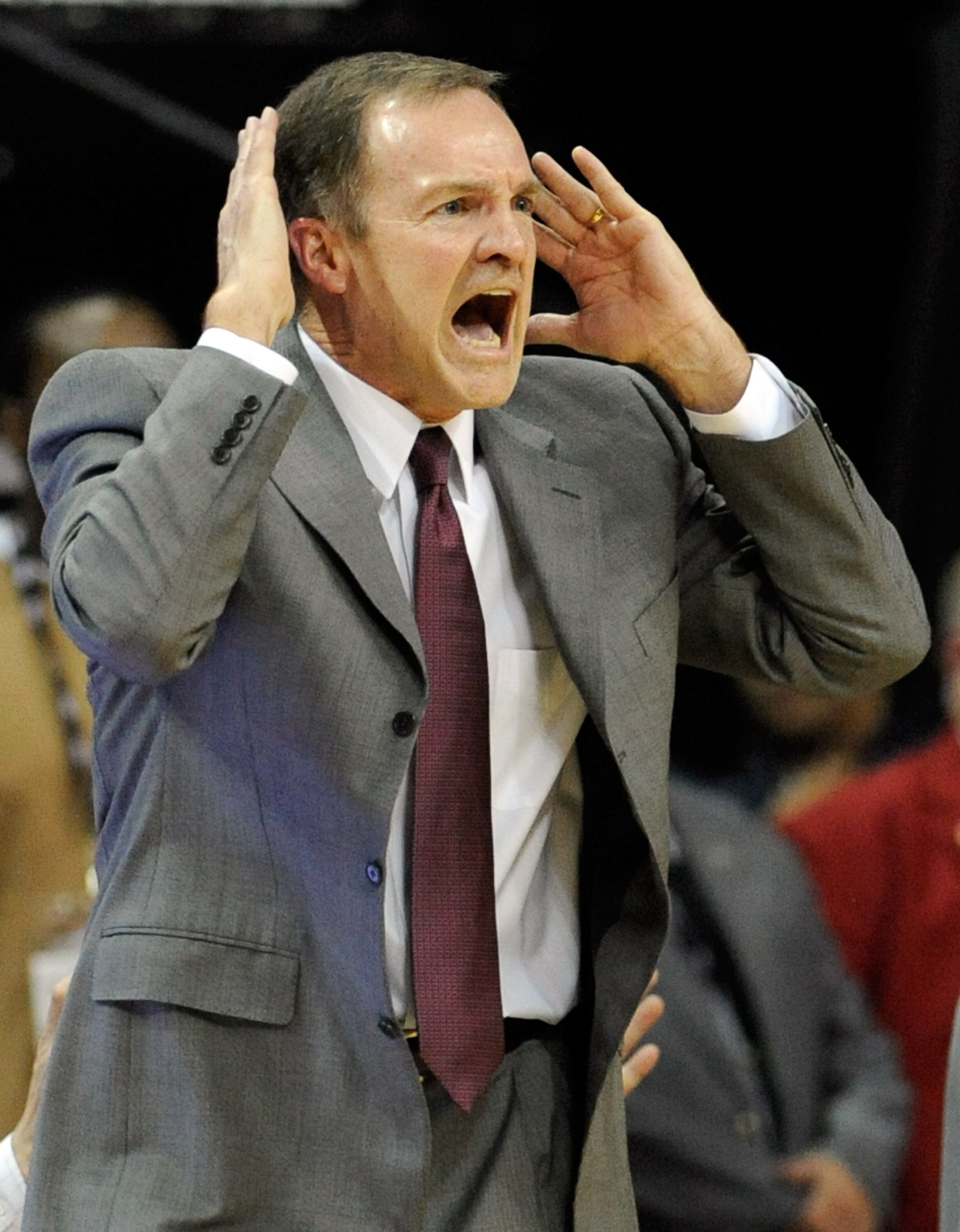 LAS VEGAS - MARCH 12:  Head coach Lon Kruger of the UNLV Rebels reacts during a semifinal game against the Brigham Young University Cougars during the Conoco Mountain West Conference Basketball tournament at the Thomas & Mack Center March 12, 2010 in Las