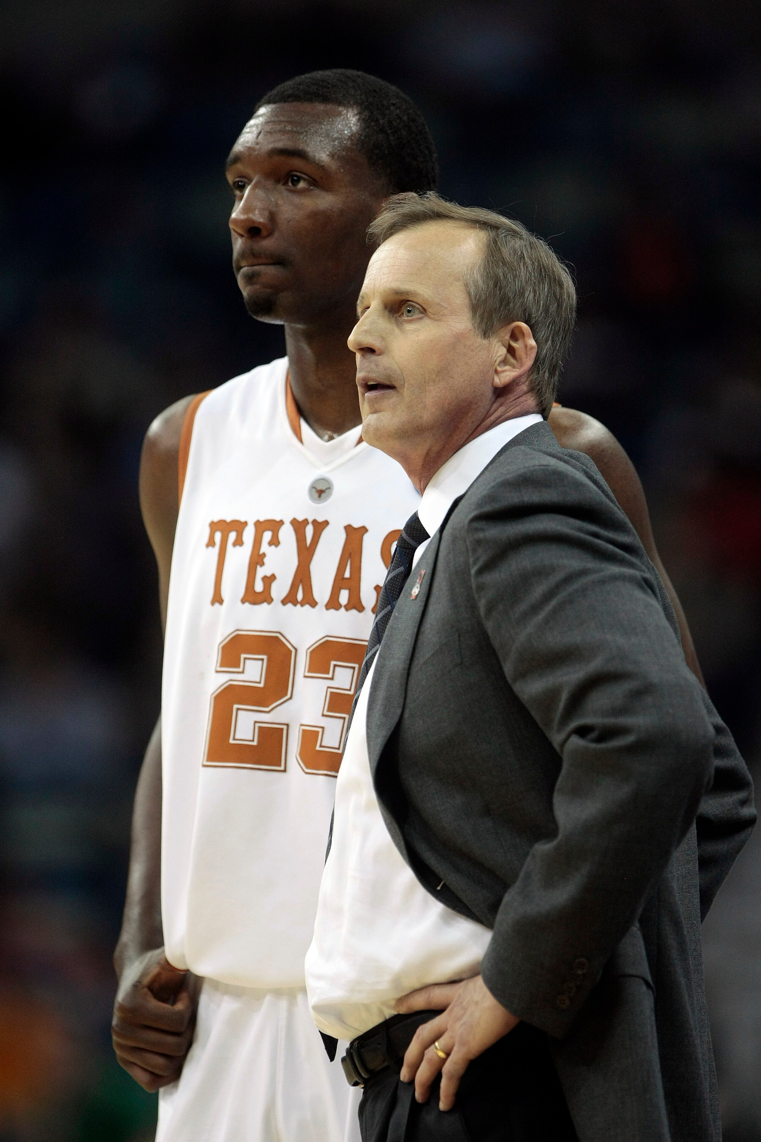 NEW ORLEANS - MARCH 18: Coach Rick Barnes of the Texas Longhorns talks with player Jordan Hamilton #23 near the end of an 81-80 loss to the Wake Forest Demon Deacons during the first round of the 2010 NCAA mens basketball tournament at the New Orleans Are NEW ORLEANS - MARCH 18: Coach Rick Barnes of the Texas Longhorns talks with player Jordan Hamilton #23 near the end of an 81-80 loss to the Wake Forest Demon Deacons during the first round of the 2010 NCAA mens basketball tournament at the New Orleans Are