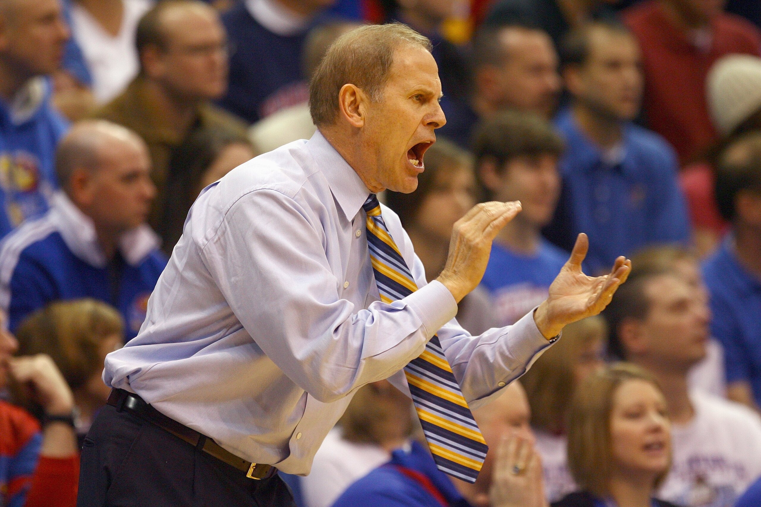 LAWRENCE, KS - DECEMBER 19: Head coach John Beilein of the Mighigan Wolverines yells during the game against the Kansas Jayhawks on December 19, 2009 at Allen Fieldhouse in Lawrence, Kansas. (Photo by Jamie Squire/Getty Images) LAWRENCE, KS - DECEMBER 19: Head coach John Beilein of the Mighigan Wolverines yells during the game against the Kansas Jayhawks on December 19, 2009 at Allen Fieldhouse in Lawrence, Kansas. (Photo by Jamie Squire/Getty Images)