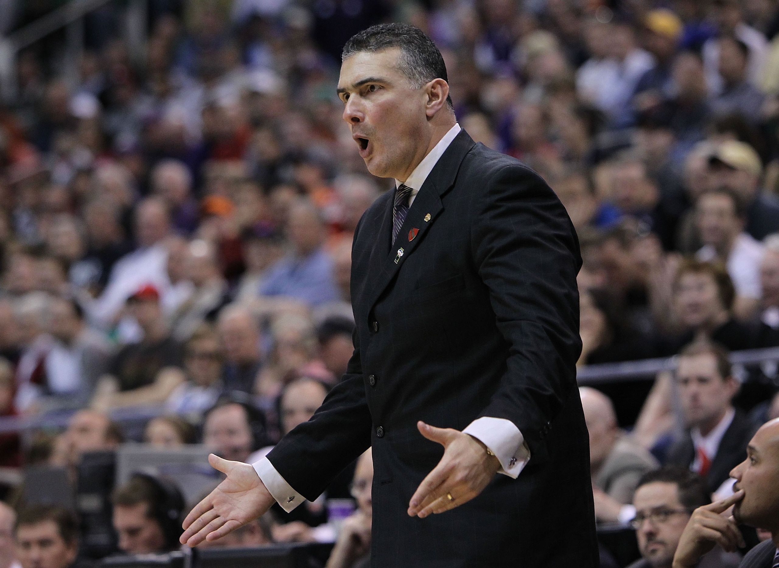 SALT LAKE CITY - MARCH 27: Head coach Frank Martin of the Kansas State Wildcats looks on against the Butler Bulldogs during the west regional final of the 2010 NCAA men's basketball tournament at the Energy Solutions Arena on March 27, 2010 in Salt Lake SALT LAKE CITY - MARCH 27: Head coach Frank Martin of the Kansas State Wildcats looks on against the Butler Bulldogs during the west regional final of the 2010 NCAA men's basketball tournament at the Energy Solutions Arena on March 27, 2010 in Salt Lake