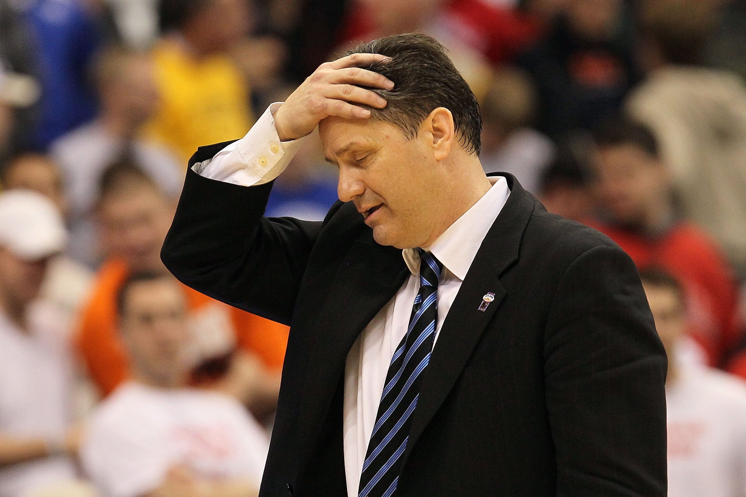 SYRACUSE, NY - MARCH 25: Head coach John Calipari of the Kentucky Wildcats reacts as he coaches against the Cornell Big Red during the east regional semifinal of the 2010 NCAA men's basketball tournament at the Carrier Dome on March 25, 2010 in Syracuse, SYRACUSE, NY - MARCH 25: Head coach John Calipari of the Kentucky Wildcats reacts as he coaches against the Cornell Big Red during the east regional semifinal of the 2010 NCAA men's basketball tournament at the Carrier Dome on March 25, 2010 in Syracuse,