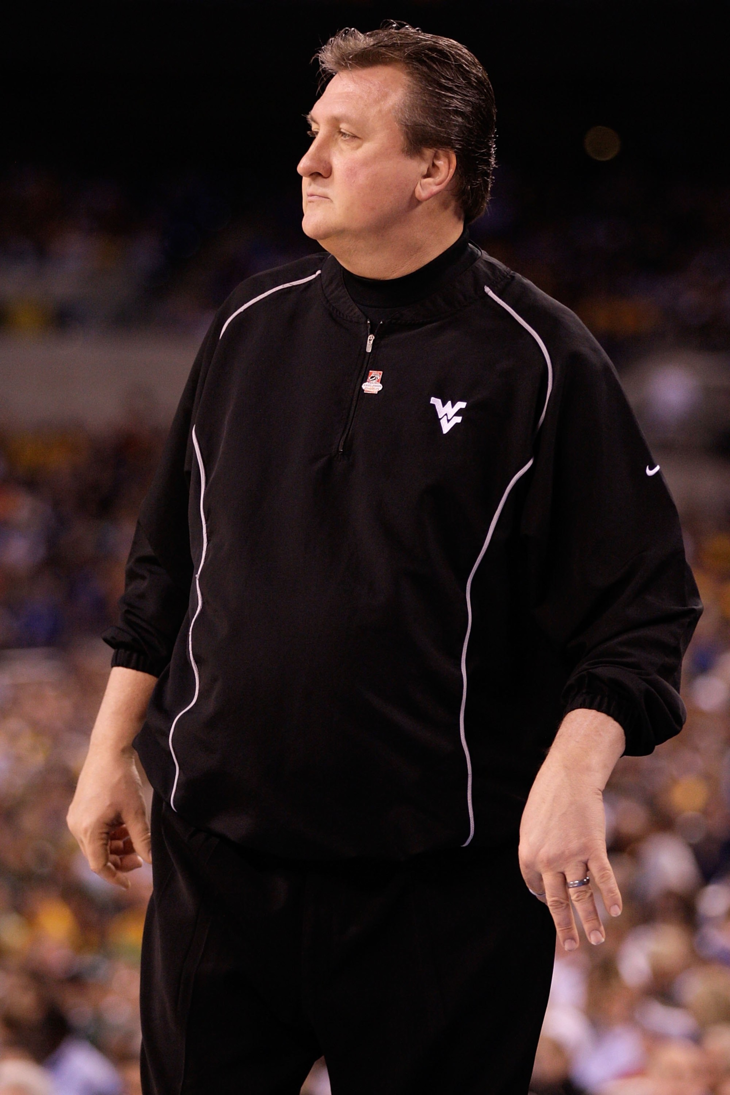INDIANAPOLIS - APRIL 03: Head coach Bob Huggins of the West Virginia Mountaineers reacts while taking on the Duke Blue Devils during the National Semifinal game of the 2010 NCAA Division I Men's Basketball Championship at Lucas Oil Stadium on April 3, 20 INDIANAPOLIS - APRIL 03: Head coach Bob Huggins of the West Virginia Mountaineers reacts while taking on the Duke Blue Devils during the National Semifinal game of the 2010 NCAA Division I Men's Basketball Championship at Lucas Oil Stadium on April 3, 20