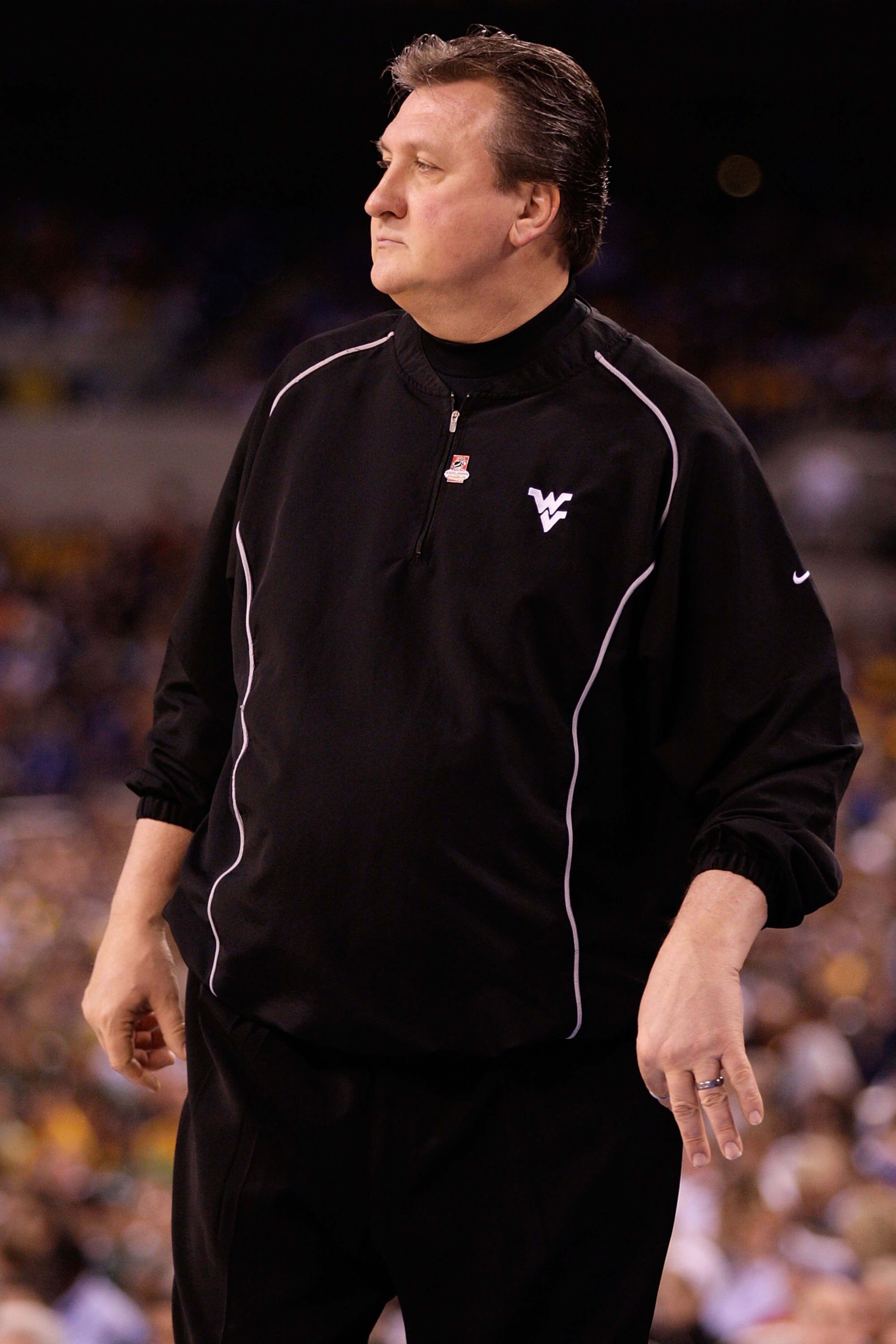 INDIANAPOLIS - APRIL 03: Head coach Bob Huggins of the West Virginia Mountaineers reacts while taking on the Duke Blue Devils during the National Semifinal game of the 2010 NCAA Division I Men's Basketball Championship at Lucas Oil Stadium on April 3, 20 INDIANAPOLIS - APRIL 03: Head coach Bob Huggins of the West Virginia Mountaineers reacts while taking on the Duke Blue Devils during the National Semifinal game of the 2010 NCAA Division I Men's Basketball Championship at Lucas Oil Stadium on April 3, 20