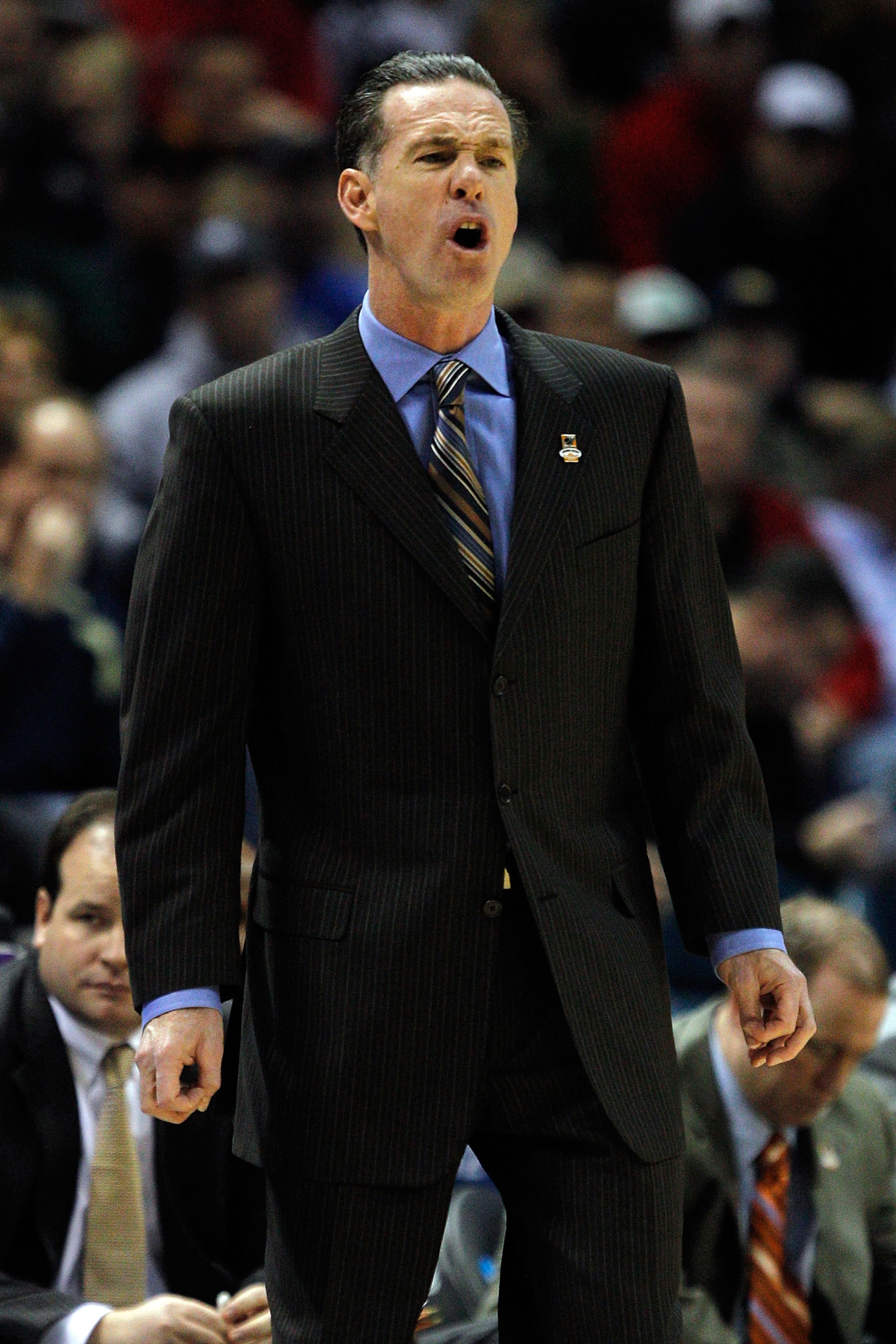 MILWAUKEE - MARCH 21: Head coach Jamie Dixon of the Pittsburgh Panthers calls out in the first half against the Xavier Musketeers during the second round of the 2010 NCAA men's basketball tournament at the Bradley Center on March 21, 2010 in Milwaukee, W MILWAUKEE - MARCH 21: Head coach Jamie Dixon of the Pittsburgh Panthers calls out in the first half against the Xavier Musketeers during the second round of the 2010 NCAA men's basketball tournament at the Bradley Center on March 21, 2010 in Milwaukee, W