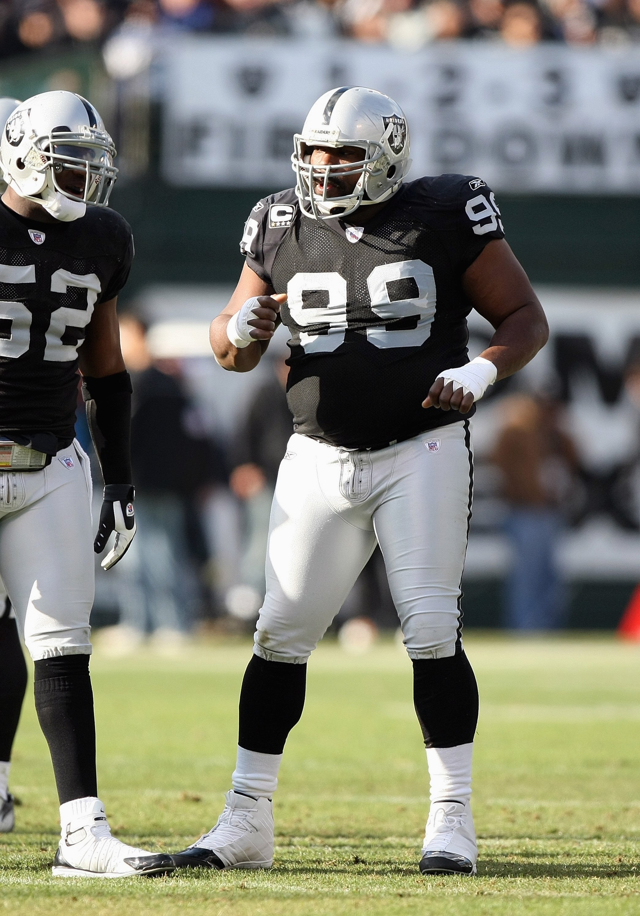 OAKLAND, CA - DECEMBER 30: Warren Sapp #99 of the Oakland Raiders reacts on the field during an NFL game against the San Diego Chargers on December 30, 2007 at McAfee Coliseum in Oakland, California. (Photo by Jed Jacobsohn/Getty Images)