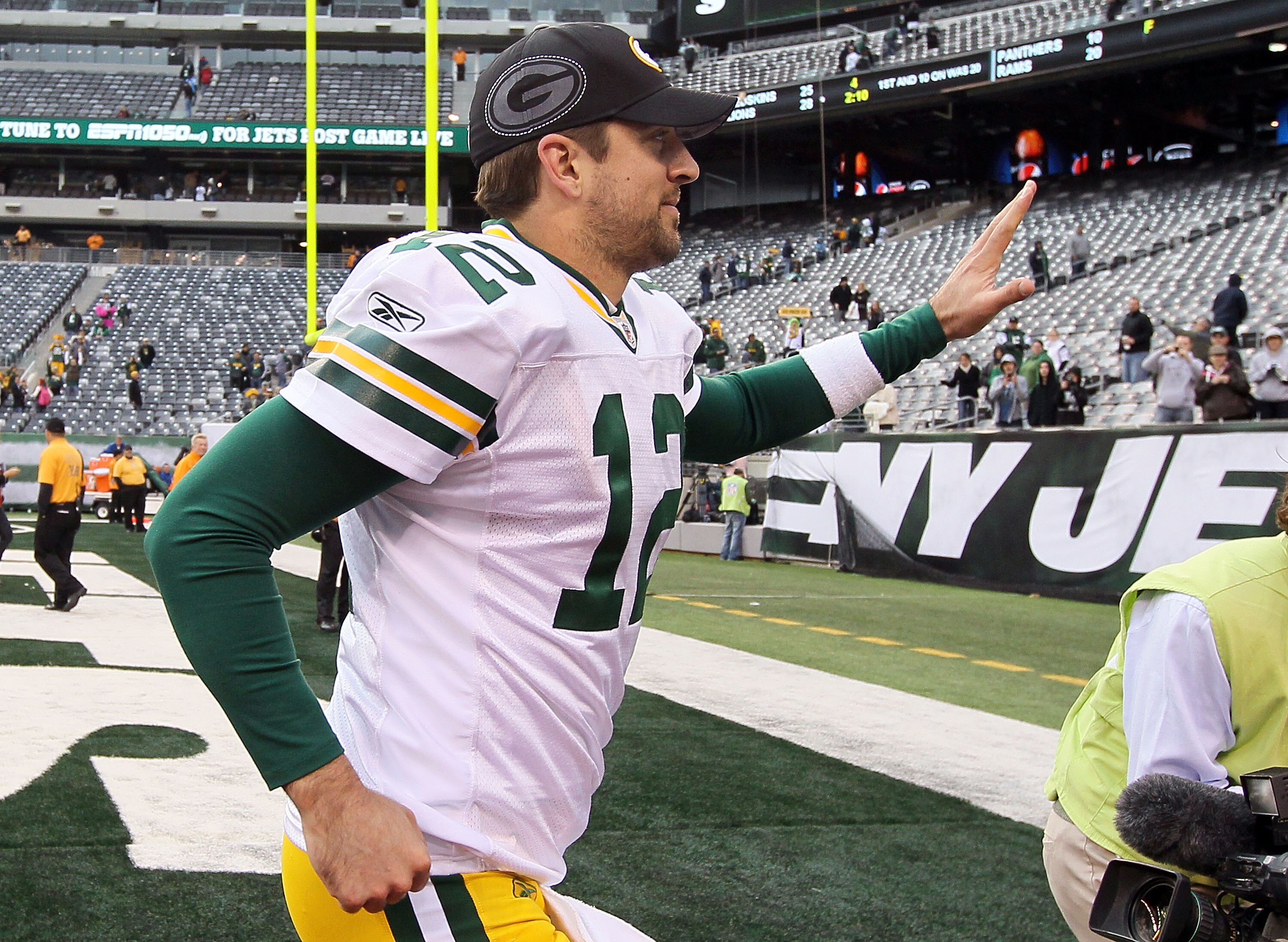 EAST RUTHERFORD, NJ - OCTOBER 31:  Aaron Rodgers #12 of the Green Bay Packers celebrates after defeating the New York Jets on October 31, 2010 at the New Meadowlands Stadium in East Rutherford, New Jersey. The Packers defeated the Jets 9-0.  (Photo by Jim