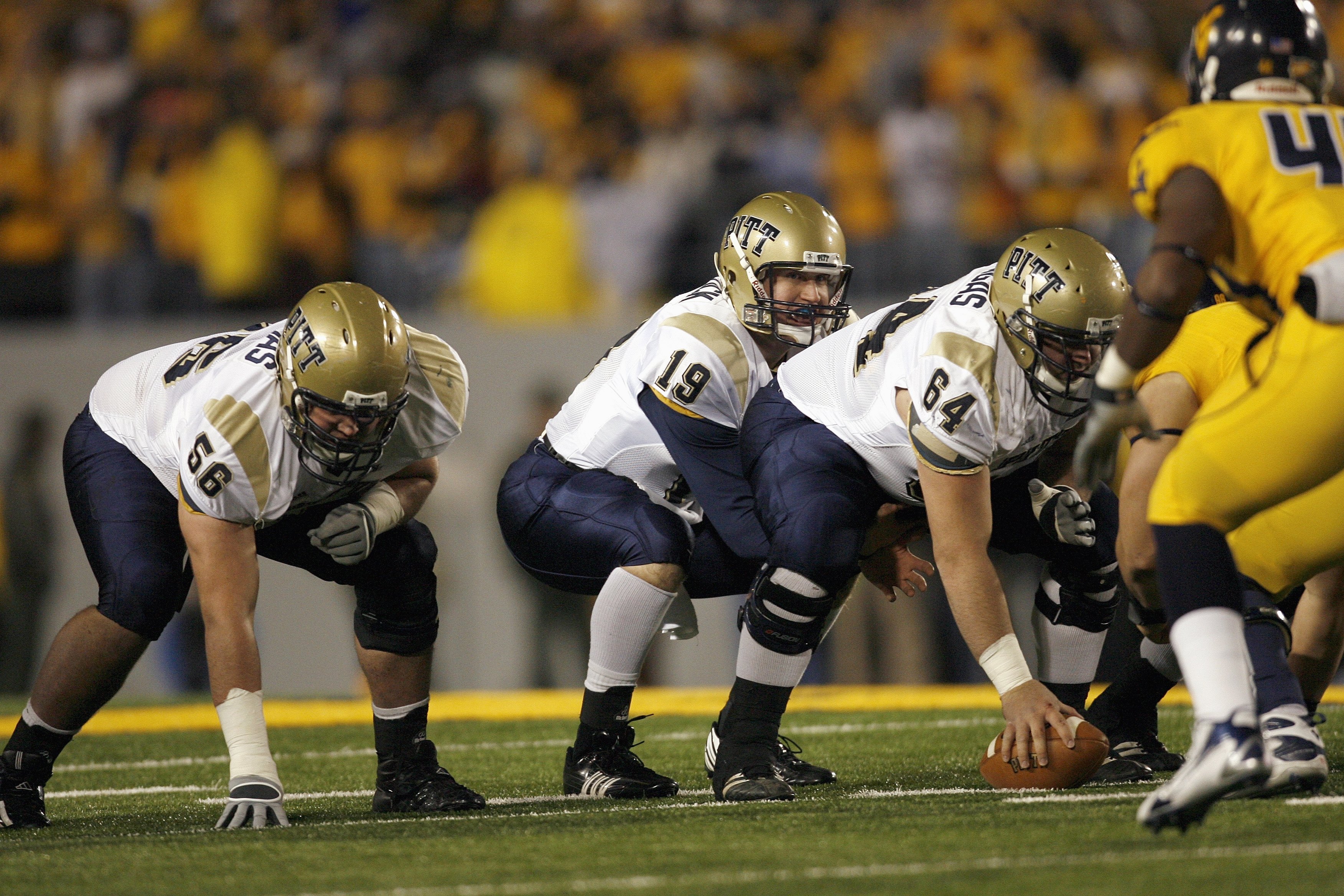 MORGANTOWN, WV - DECEMBER 1: Pat Bostick #19 of the Pittsburgh Panthers calls the play during the game against the West Virginia Mountaineers at Milan Puskar Stadium on December 1, 2007 in Morgantown, West Virginia. Pittsburgh defeated West Virginia 13-9.