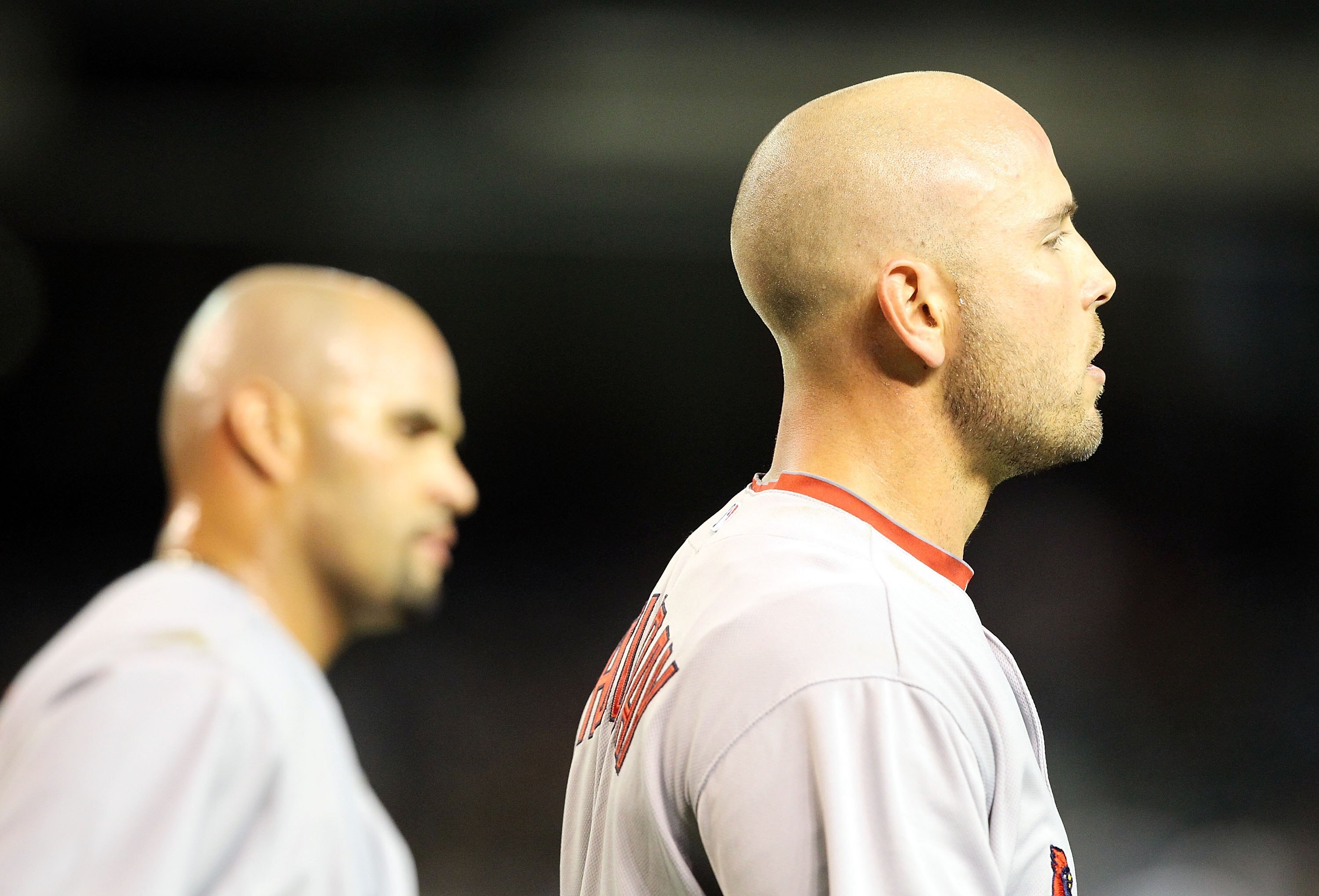 PHOENIX - APRIL 19:  Matt Holliday #7 and Albert Pujols #5 of the St. Louis Cardinals during the Major League Baseball game against the Arizona Diamondbacks at Chase Field on April 19, 2010 in Phoenix, Arizona. The Cardinals defeated the Diamondbacks 4-2.