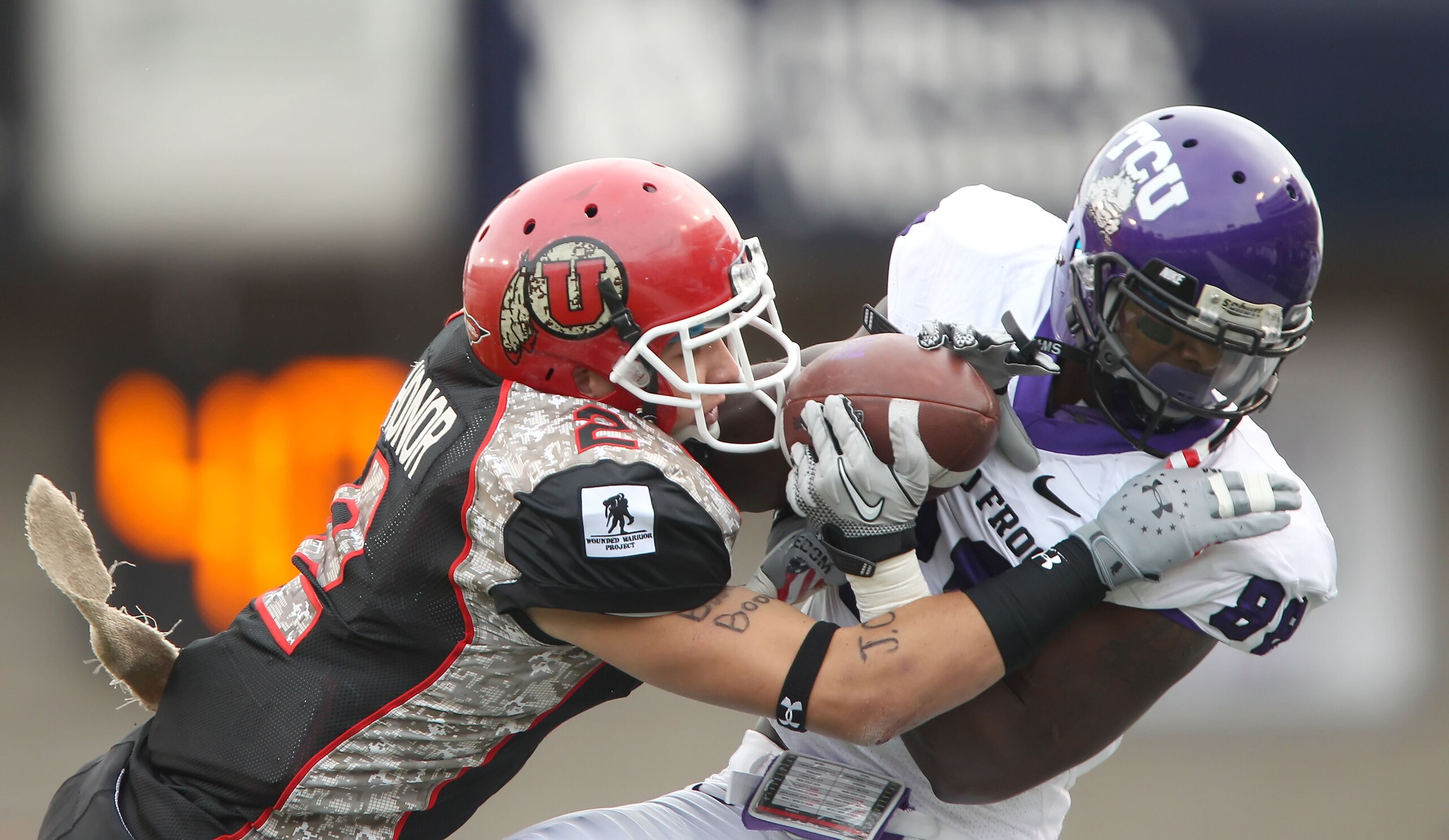 SALT LAKE CITY, UT - NOVEMBER 6: Brian Blechen #2 of the Utah Utes tackles Jimmy Young #88 of the TCU Horned Frogs during the second half of an NCAA Football game November 6, 2010 at Rice-Eccles Stadium in Salt Lake City, Utah. TCU Beat Utah 47-7. (Photo SALT LAKE CITY, UT - NOVEMBER 6: Brian Blechen #2 of the Utah Utes tackles Jimmy Young #88 of the TCU Horned Frogs during the second half of an NCAA Football game November 6, 2010 at Rice-Eccles Stadium in Salt Lake City, Utah. TCU Beat Utah 47-7. (Photo