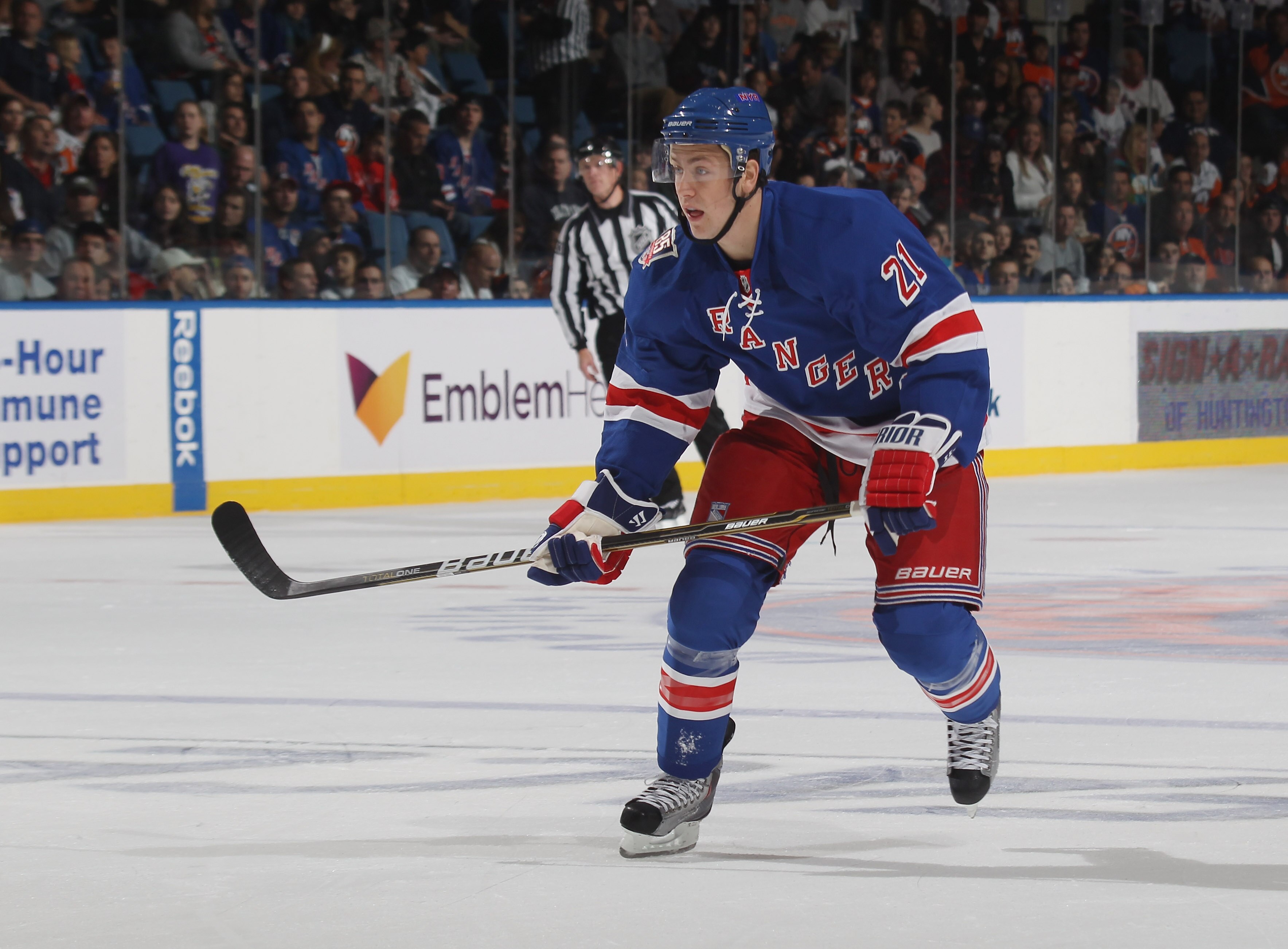 UNIONDALE, NY - OCTOBER 11:  Derek Stepan #21 of the New York Rangers skates against the New York Islanders the Nassau Coliseum on October 11, 2010 in Uniondale, New York.  (Photo by Bruce Bennett/Getty Images)