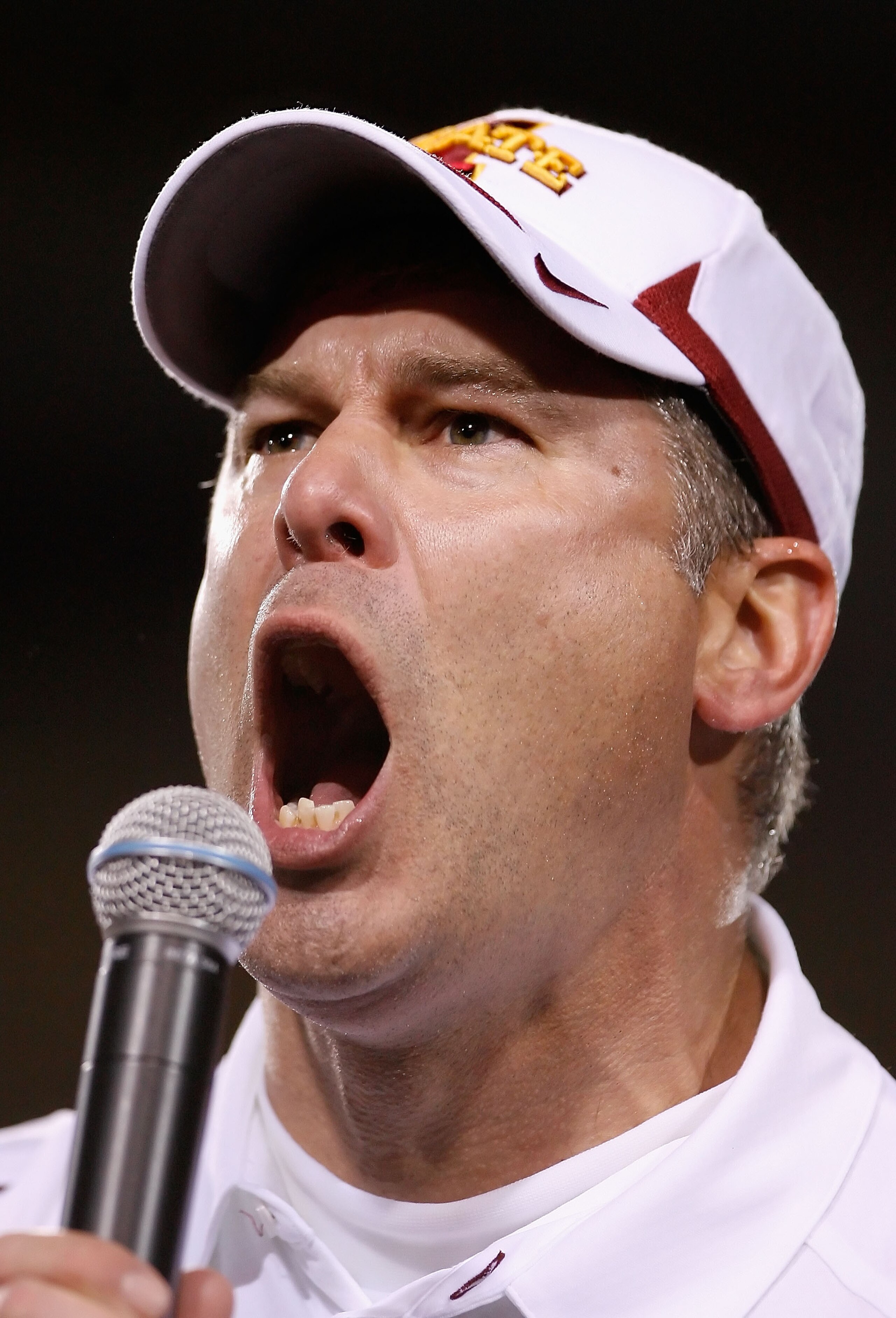 TEMPE, AZ - DECEMBER 31:  Head coach Paul Rhoads of the Iowa State Cyclones speaks to the crowd after defeating the Minnesota Golden Gophers in the Insight Bowl at Arizona Stadium on December 31, 2009 in Tempe, Arizona.  The Cyclones defeated the Golden G