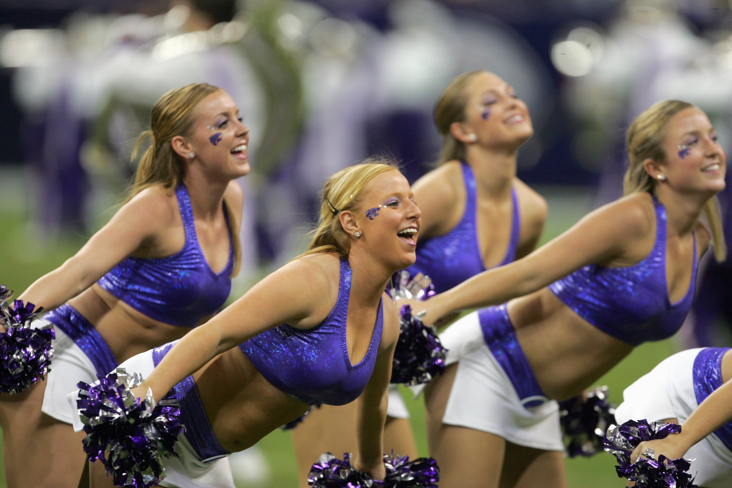 HOUSTON - DECEMBER 28: cheerleaders of the Kansas State Wildcats perform during the Texas Bowl against the Rutgers Scarlet Knights on December 28, 2006 at Reliant Stadium in Houston Texas. (Photo by Stephen Dunn/Getty Images)