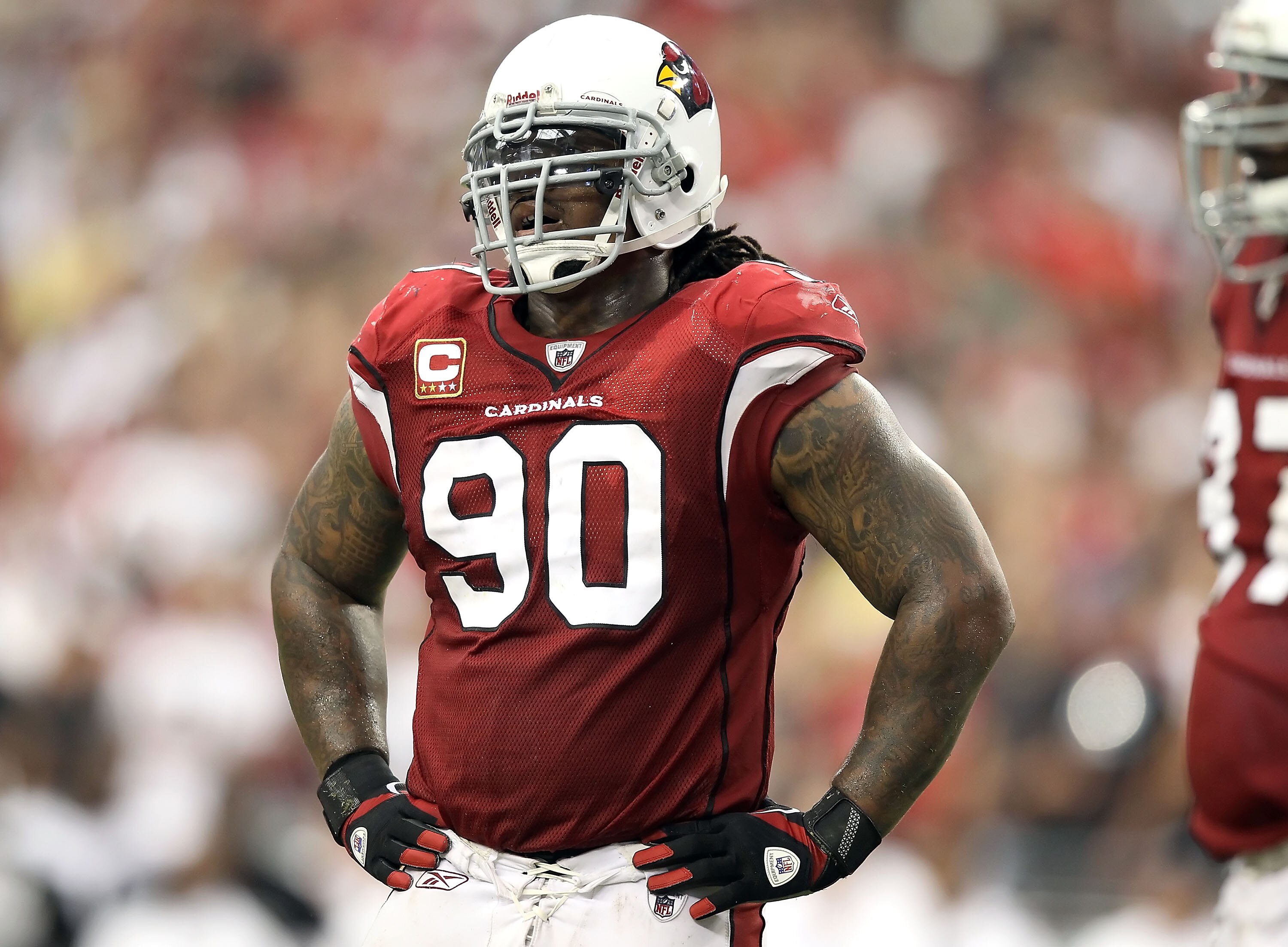GLENDALE, AZ - SEPTEMBER 26:  Defensive tackle Darnell Dockett #90 of the Arizona Cardinals during the NFL game against the Oakland Raiders at the University of Phoenix Stadium on September 26, 2010 in Glendale, Arizona.  The Cardinals defeated the Raider