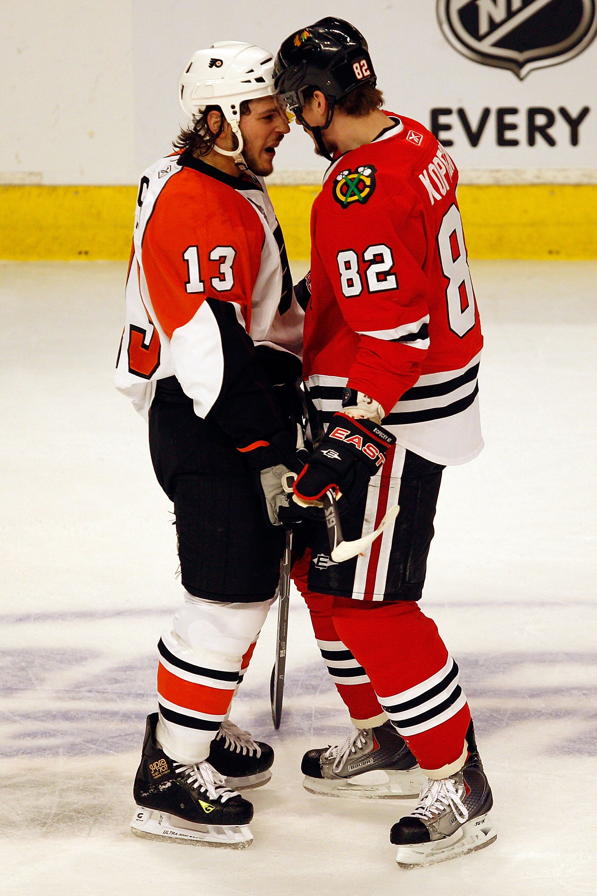 CHICAGO - MAY 31:  Daniel Carcillo #13 of the Philadelphia Flyers and Tomas Kopecky #82 of the Chicago Blackhawks argue on the ice in the first period of Game Two of the 2010 NHL Stanley Cup Final at the United Center on May 31, 2010 in Chicago, Illinois.
